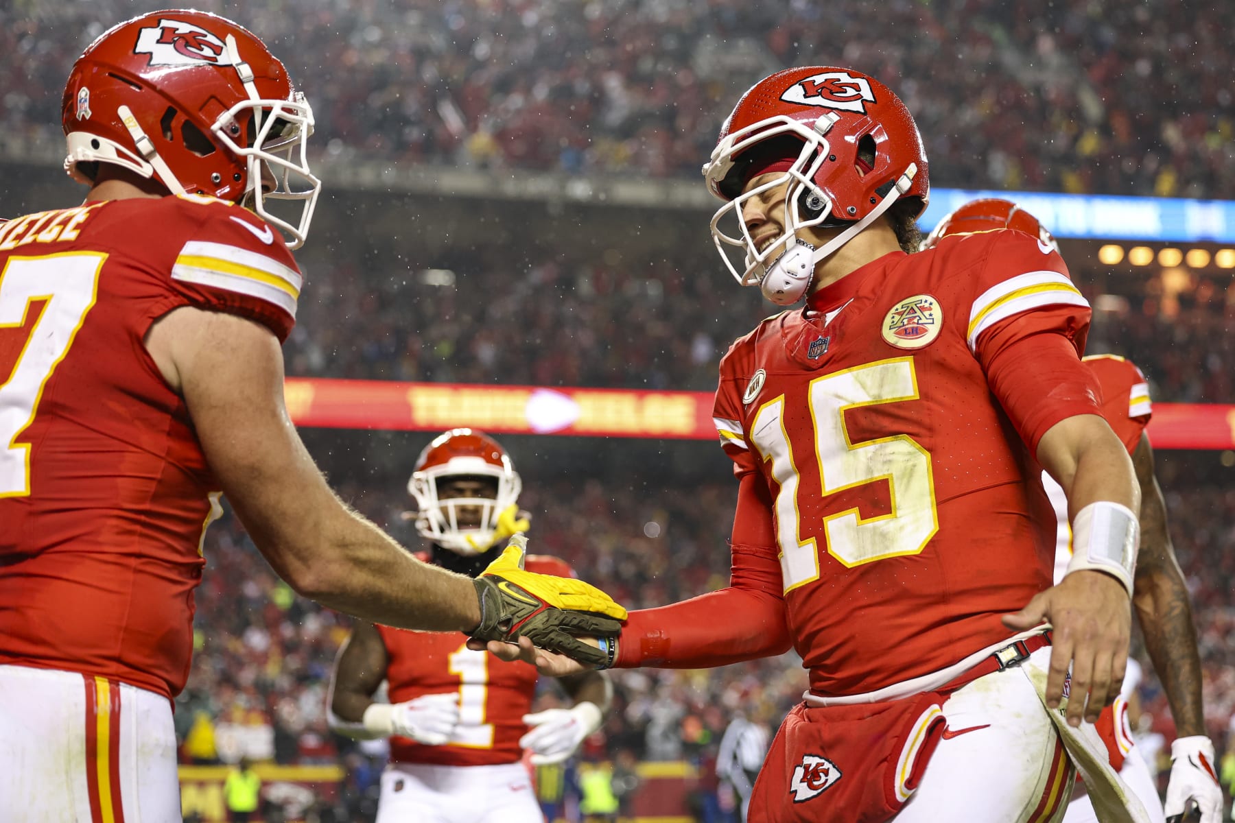 KANSAS CITY, MO - NOVEMBER 20: Travis Kelce #87 of the Kansas City Chiefs celebrates with Patrick Mahomes #15 after scoring a touchdown during an NFL football game against the Philadelphia Eagles at GEHA Field at Arrowhead Stadium on November 20, 2023 in Kansas City, Missouri. (Photo by Perry Knotts/Getty Images)
