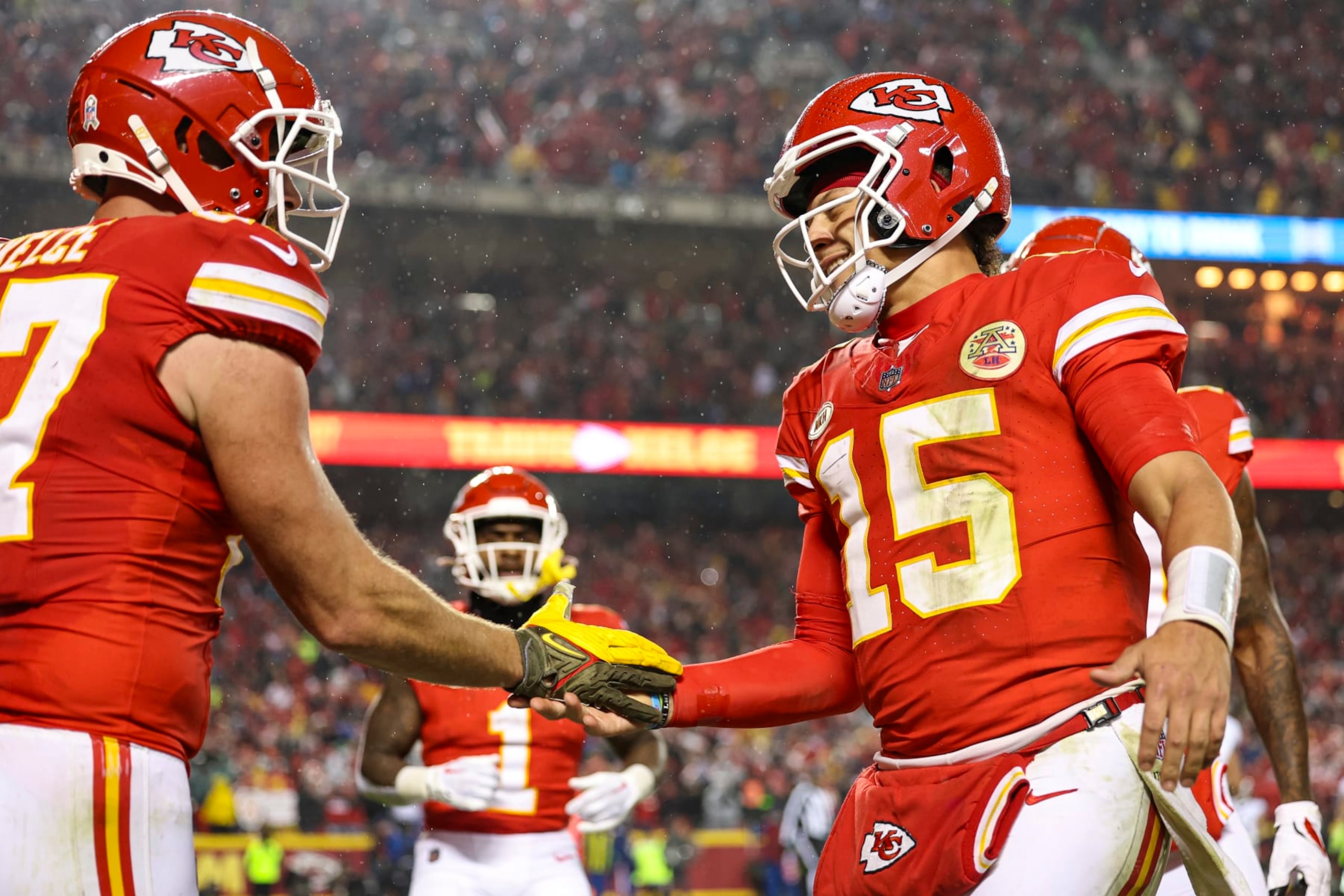 KANSAS CITY, MO - NOVEMBER 20: Travis Kelce #87 of the Kansas City Chiefs celebrates with Patrick Mahomes #15 after scoring a touchdown during an NFL football game against the Philadelphia Eagles at GEHA Field at Arrowhead Stadium on November 20, 2023 in Kansas City, Missouri. (Photo by Perry Knotts/Getty Images)