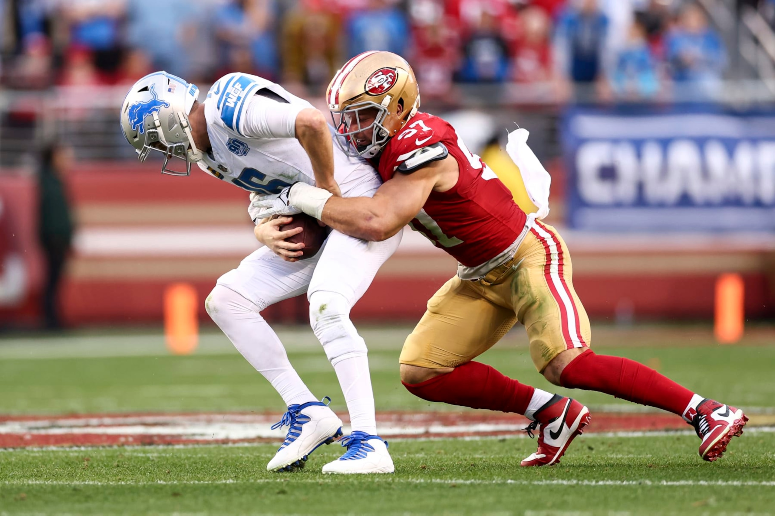 SANTA CLARA, CA - JANUARY 28: Nick Bosa #97 of the San Francisco 49ers sacks Jared Goff #16 of the Detroit Lions during the second quarter of the NFC Championship NFL football game at Levi's Stadium on January 28, 2024 in Santa Clara, California. (Photo by Kevin Sabitus/Getty Images)