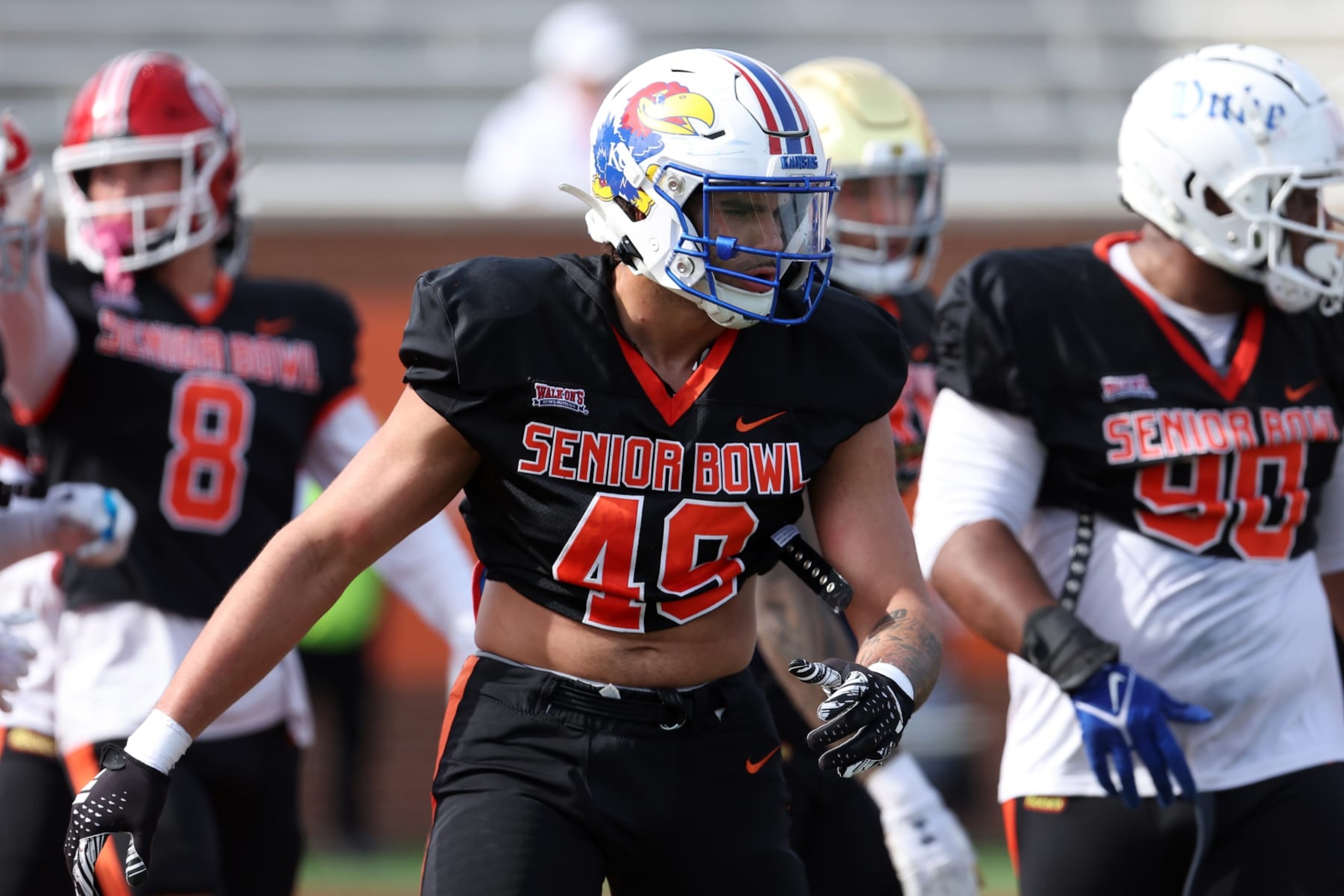 MOBILE, AL - FEBRUARY 01: National edge Austin Booker of Kansas (49) during the National team practice for the Reese's Senior Bowl on February 31, 2024 at Hancock Whitney Stadium in Mobile, Alabama.  (Photo by Michael Wade/Icon Sportswire via Getty Images)