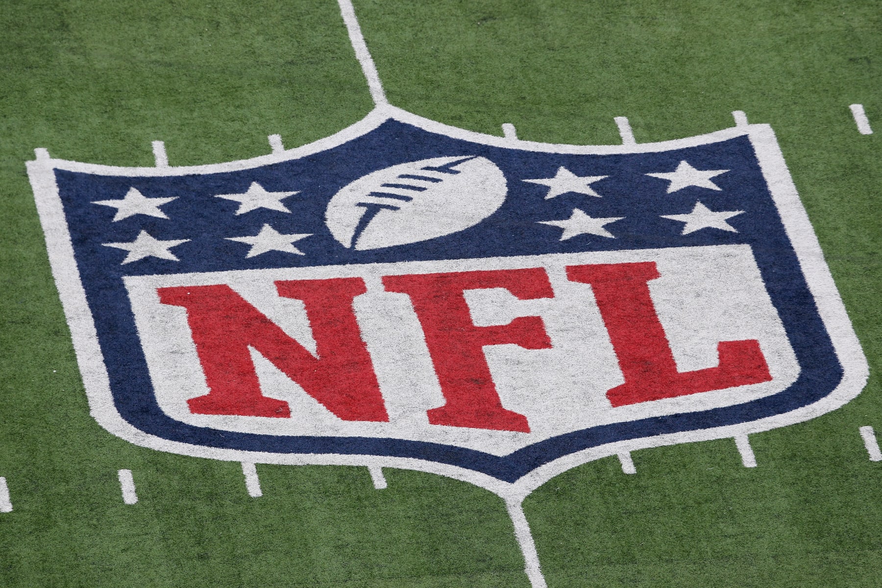 EAST RUTHERFORD, NJ - JANUARY 08:  A detail of the official National Football League NFL logo is seen painted on the turf as the New York Giants host the Atlanta Falcons during their NFC Wild Card Playoff game at MetLife Stadium on January 8, 2012 in East Rutherford, New Jersey.  (Photo by Nick Laham/Getty Images)