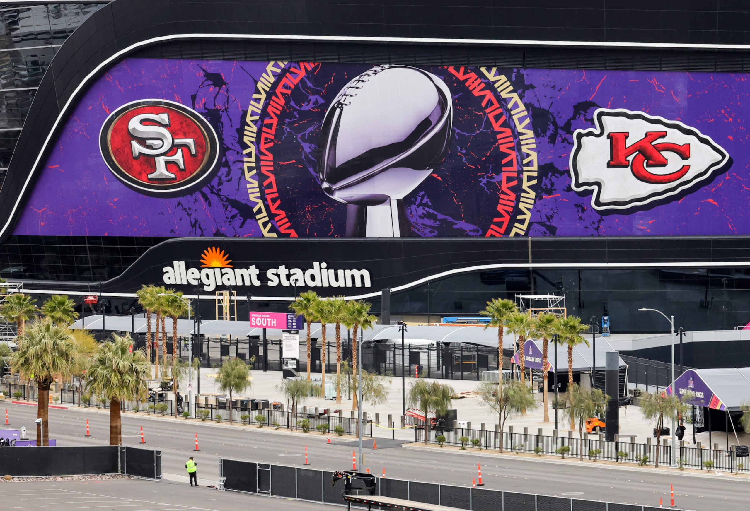 LAS VEGAS, NEVADA - FEBRUARY 01: An exterior view shows an image of the Lombardi Trophy, team logos and signage for Super Bowl LVIII at Allegiant Stadium on February 01, 2024 in Las Vegas, Nevada. The game will be played on February 11, 2024, between the Kansas City Chiefs and the San Francisco 49ers. (Photo by Ethan Miller/Getty Images)