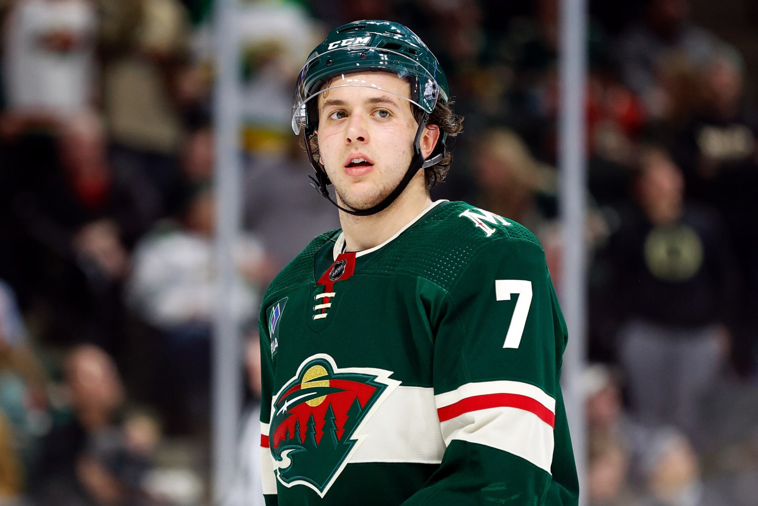 ST PAUL, MINNESOTA - JANUARY 25: Brock Faber #7 of the Minnesota Wild looks on against the Nashville Predators in the second period at Xcel Energy Center on January 25, 2024 in St Paul, Minnesota. (Photo by David Berding/Getty Images)