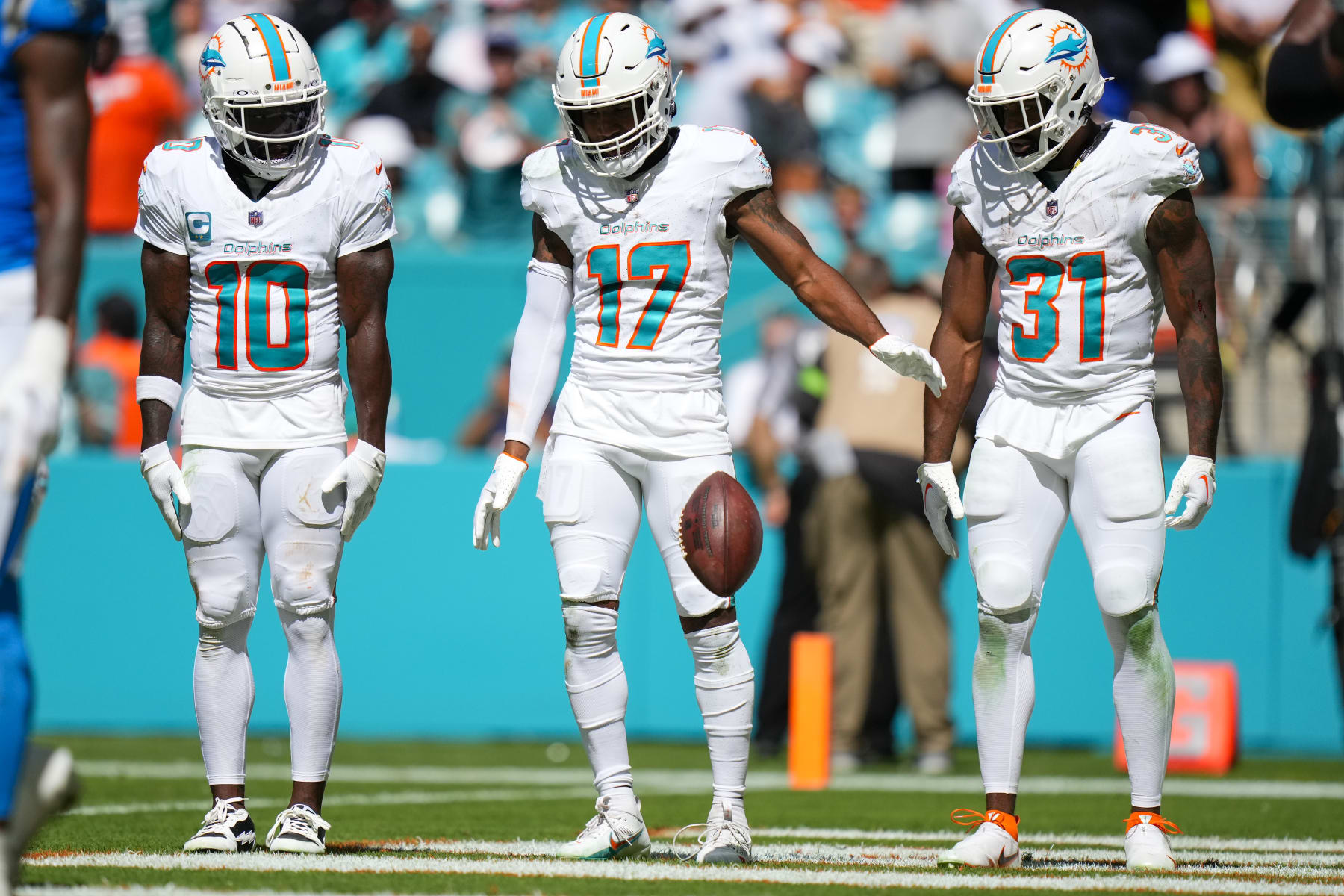 Miami Dolphins WR Tyreek Hill, WR Jaylen Waddle and RB Raheem Mostert