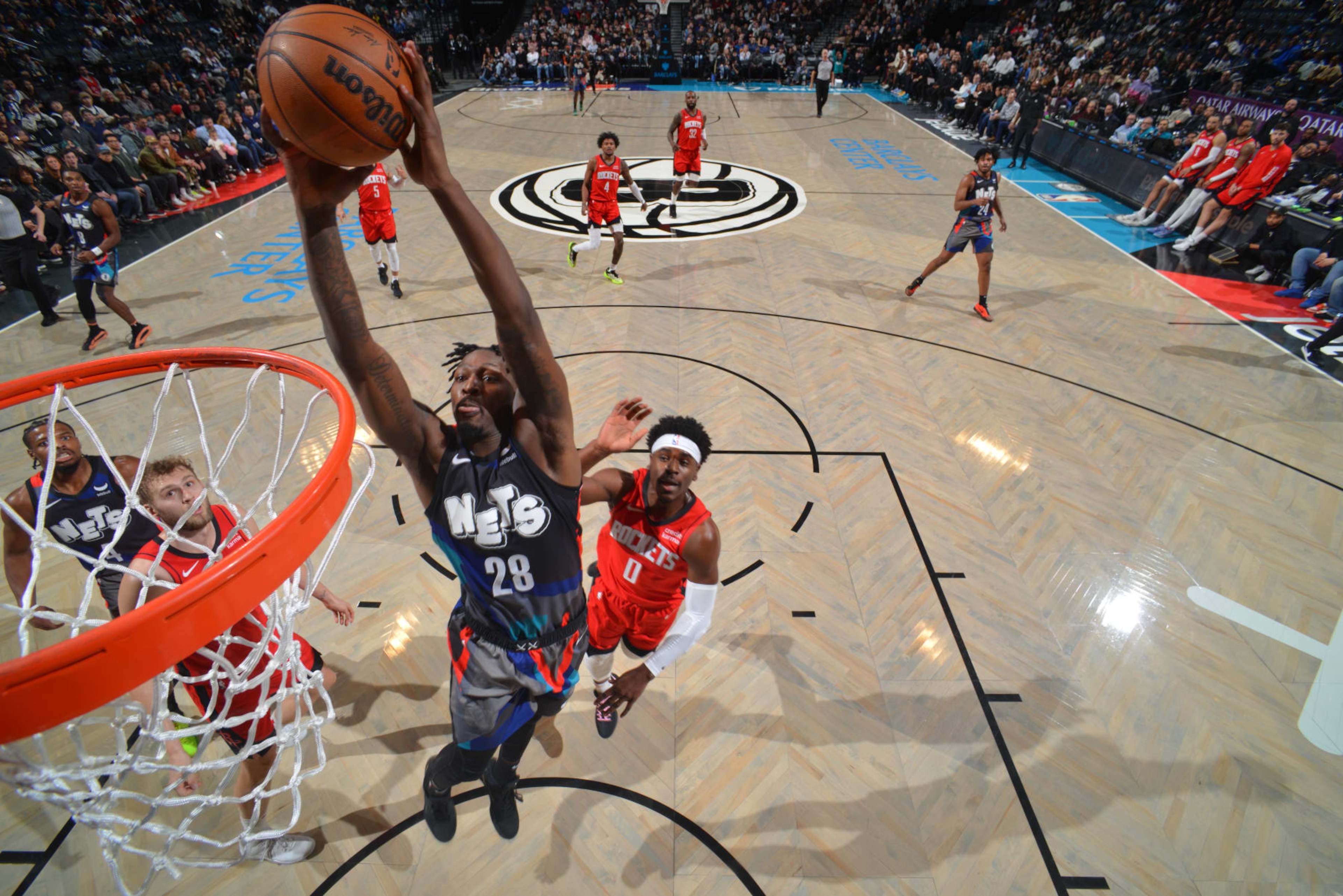 BROOKLYN, NY - JANUARY 27: Dorian Finney-Smith #28 of the Brooklyn Nets dunks the ball during the game against the Houston Rockets on January 27, 2024 at Barclays Center in Brooklyn, New York. NOTE TO USER: User expressly acknowledges and agrees that, by downloading and or using this Photograph, user is consenting to the terms and conditions of the Getty Images License Agreement. Mandatory Copyright Notice: Copyright 2024 NBAE (Photo by Jesse D. Garrabrant/NBAE via Getty Images)