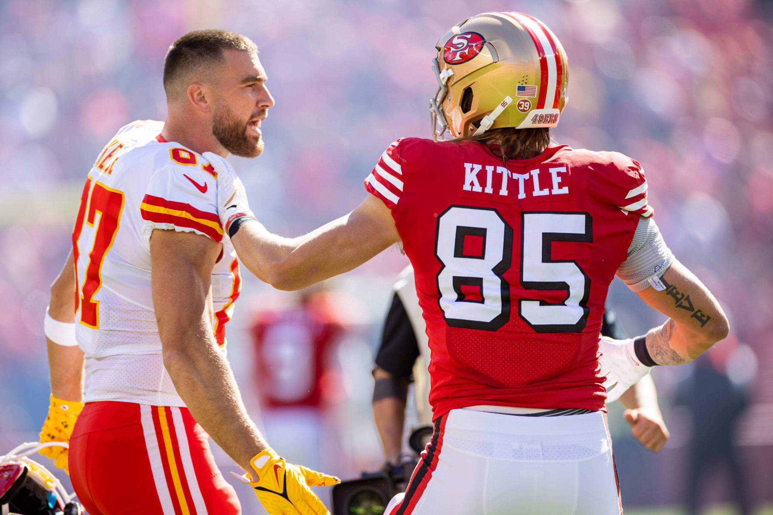 SANTA CLARA, CA - OCTOBER 23: San Francisco 49ers tight end George Kittle (85) greets Kansas City Chiefs tight end Travis Kelce (87) before the NFL professional football game between the Kansas City Chiefs and San Francisco 49ers on October 23, 2022 at Levis Stadium in Santa Clara, CA. (Photo by Bob Kupbens/Icon Sportswire via Getty Images)