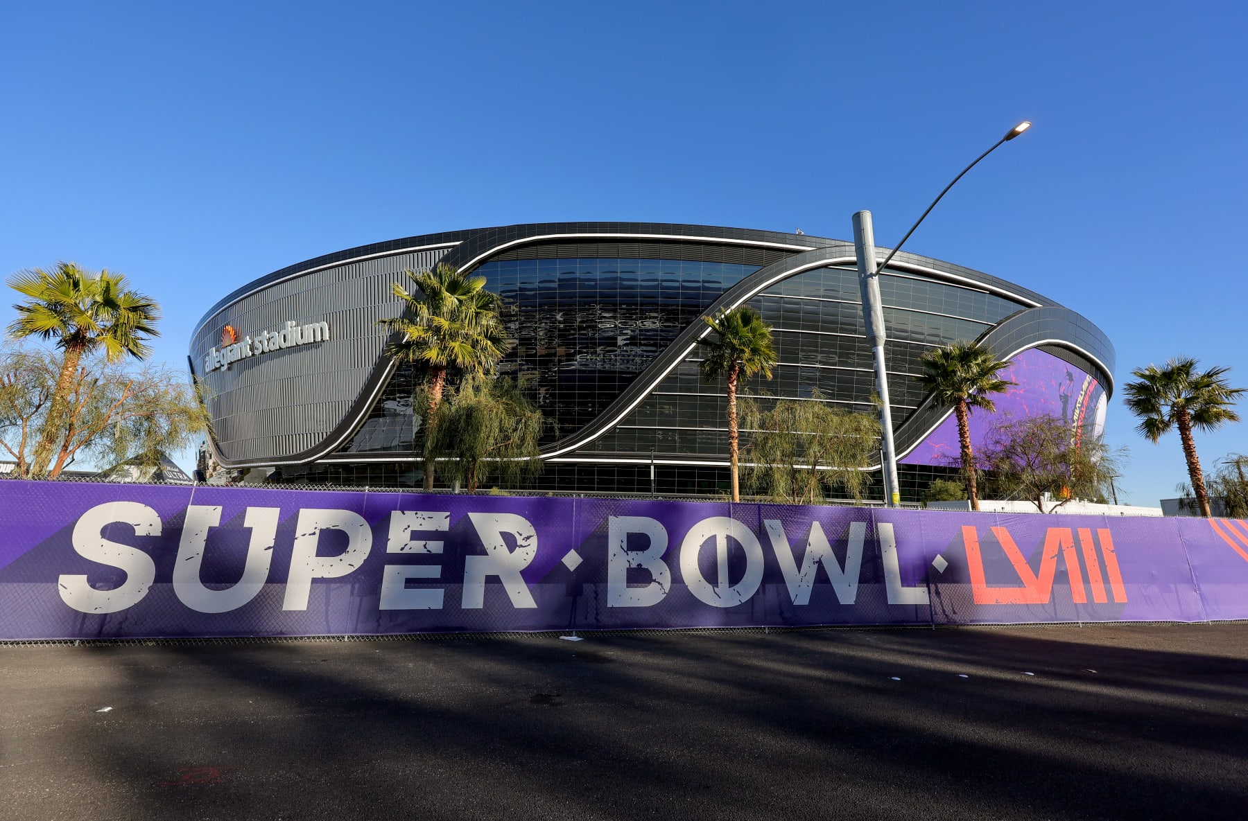 LAS VEGAS, NEVADA - JANUARY 30: An exterior view shows signage for Super Bowl LVIII on fencing around Allegiant Stadium on January 30, 2024 in Las Vegas, Nevada. The game will be played on February 11, 2024, between the Kansas City Chiefs and the San Francisco 49ers. (Photo by Ethan Miller/Getty Images)