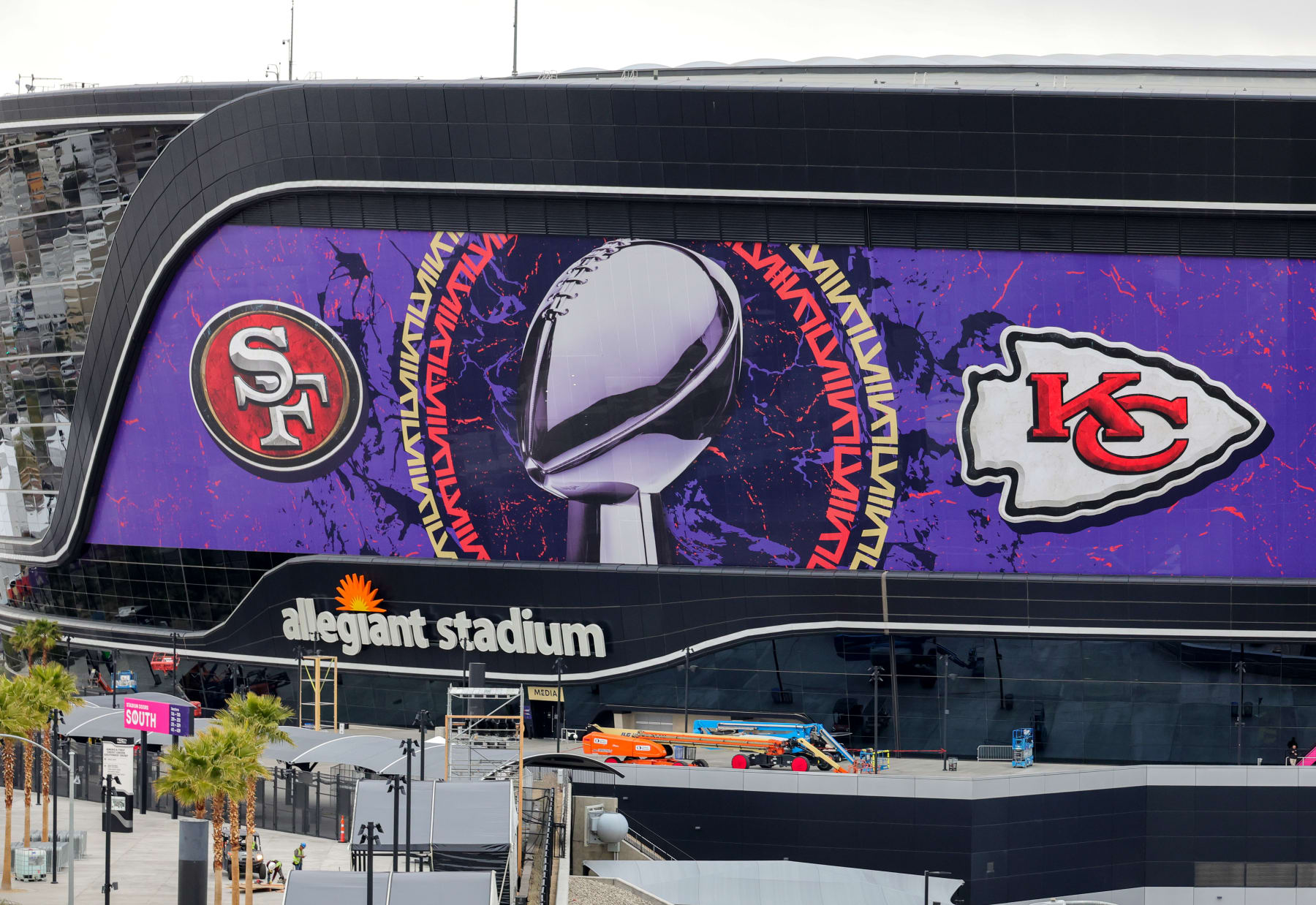 LAS VEGAS, NEVADA - FEBRUARY 01: An exterior view shows an image of the Lombardi Trophy, team logos and signage for Super Bowl LVIII at Allegiant Stadium on February 01, 2024 in Las Vegas, Nevada. The game will be played on February 11, 2024, between the Kansas City Chiefs and the San Francisco 49ers. (Photo by Ethan Miller/Getty Images)