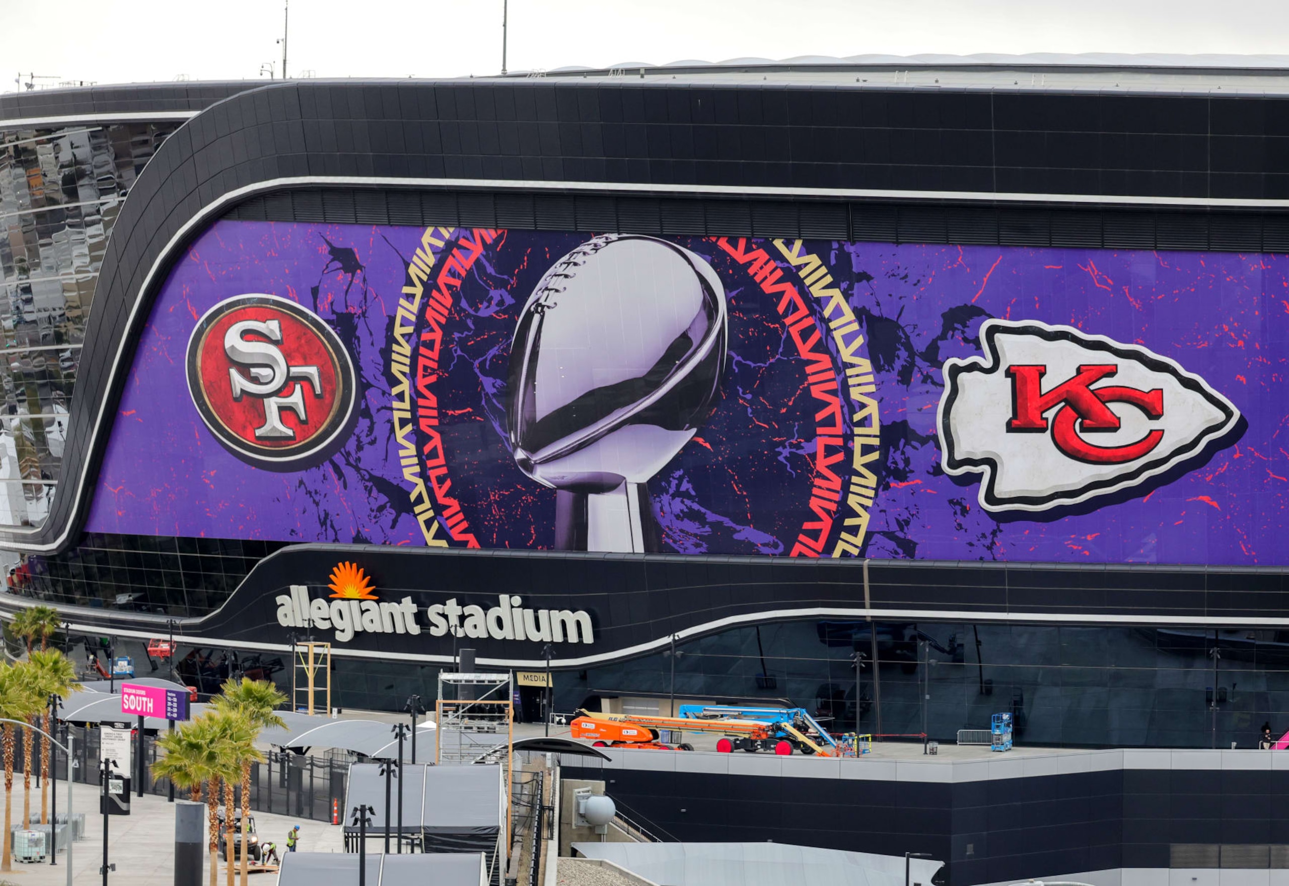 LAS VEGAS, NEVADA - FEBRUARY 01: An exterior view shows an image of the Lombardi Trophy, team logos and signage for Super Bowl LVIII at Allegiant Stadium on February 01, 2024 in Las Vegas, Nevada. The game will be played on February 11, 2024, between the Kansas City Chiefs and the San Francisco 49ers. (Photo by Ethan Miller/Getty Images)