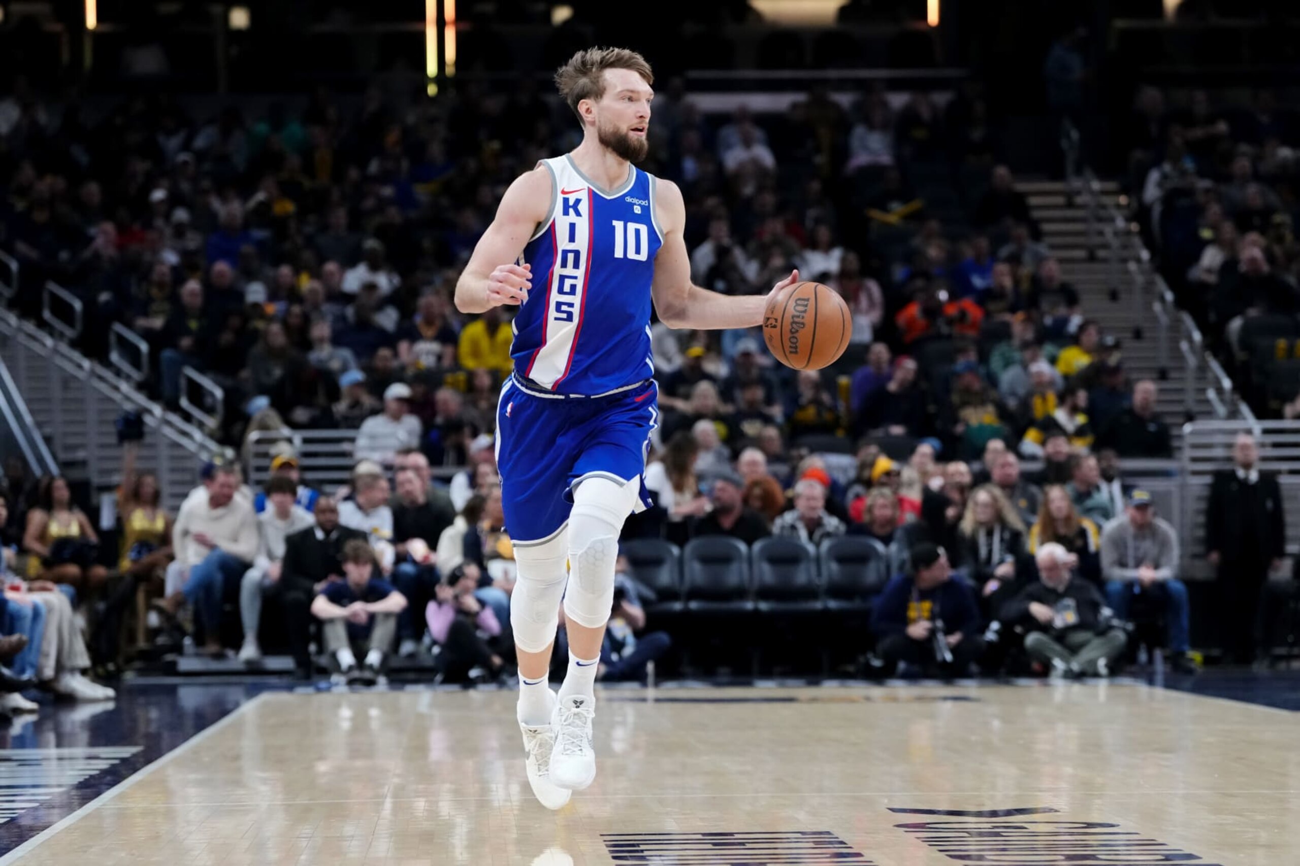 INDIANAPOLIS, INDIANA - FEBRUARY 02: Domantas Sabonis #10 of the Sacramento Kings dribbles the ball in the first quarter against the Indiana Pacers at Gainbridge Fieldhouse on February 02, 2024 in Indianapolis, Indiana. NOTE TO USER: User expressly acknowledges and agrees that, by downloading and or using this photograph, User is consenting to the terms and conditions of the Getty Images License Agreement. (Photo by Dylan Buell/Getty Images) INDIANAPOLIS, INDIANA - FEBRUARY 02: Domantas Sabonis #10 of the Sacramento Kings dribbles the ball in the first quarter against the Indiana Pacers at Gainbridge Fieldhouse on February 02, 2024 in Indianapolis, Indiana. NOTE TO USER: User expressly acknowledges and agrees that, by downloading and or using this photograph, User is consenting to the terms and conditions of the Getty Images License Agreement. (Photo by Dylan Buell/Getty Images)