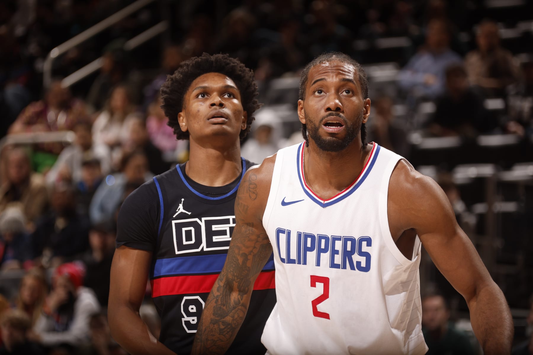 DETROIT, MI - FEBRUARY 2:  Kawhi Leonard #2 of the LA Clippers and Ausar Thompson #9 of the Detroit Pistons looks on during the game on February 2, 2024 at Little Caesars Arena in Detroit, Michigan. NOTE TO USER: User expressly acknowledges and agrees that, by downloading and/or using this photograph, User is consenting to the terms and conditions of the Getty Images License Agreement. Mandatory Copyright Notice: Copyright 2024 NBAE (Photo by Brian Sevald/NBAE via Getty Images)