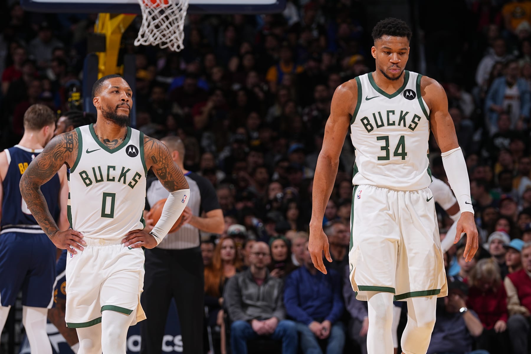 DENVER, CO - JANUARY 29: Damian Lillard #0 and Giannis Antetokounmpo #34 of the Milwaukee Bucks during the game against the Denver Nuggets on January 29, 2024 at the Ball Arena in Denver, Colorado. NOTE TO USER: User expressly acknowledges and agrees that, by downloading and/or using this Photograph, user is consenting to the terms and conditions of the Getty Images License Agreement. Mandatory Copyright Notice: Copyright 2024 NBAE (Photo by Bart Young/NBAE via Getty Images) DENVER, CO - JANUARY 29: Damian Lillard #0 and Giannis Antetokounmpo #34 of the Milwaukee Bucks during the game against the Denver Nuggets on January 29, 2024 at the Ball Arena in Denver, Colorado. NOTE TO USER: User expressly acknowledges and agrees that, by downloading and/or using this Photograph, user is consenting to the terms and conditions of the Getty Images License Agreement. Mandatory Copyright Notice: Copyright 2024 NBAE (Photo by Bart Young/NBAE via Getty Images)