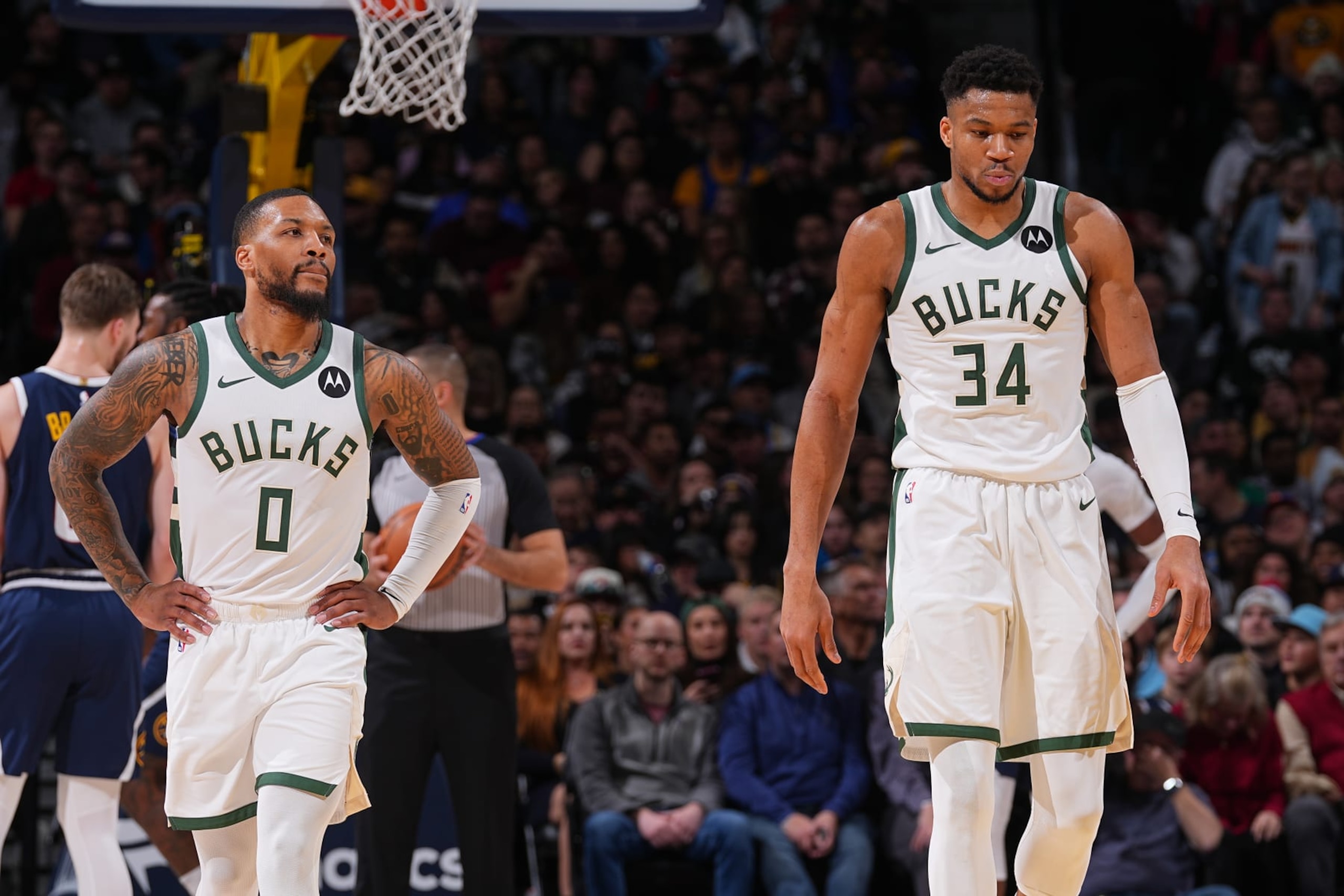 DENVER, CO - JANUARY 29: Damian Lillard #0 and Giannis Antetokounmpo #34 of the Milwaukee Bucks during the game against the Denver Nuggets on January 29, 2024 at the Ball Arena in Denver, Colorado. NOTE TO USER: User expressly acknowledges and agrees that, by downloading and/or using this Photograph, user is consenting to the terms and conditions of the Getty Images License Agreement. Mandatory Copyright Notice: Copyright 2024 NBAE (Photo by Bart Young/NBAE via Getty Images)