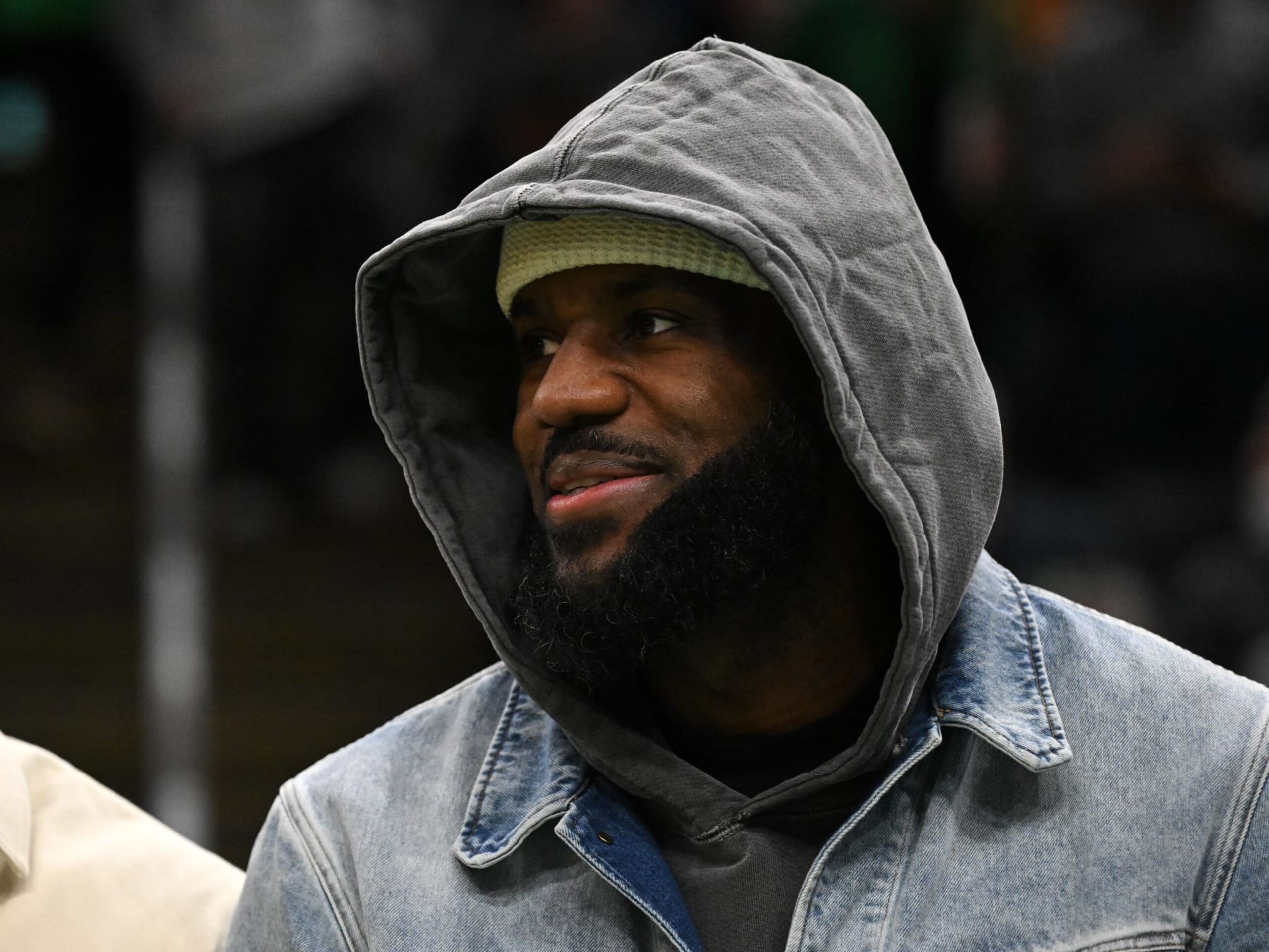 BOSTON, MASSACHUSETTS - FEBRUARY 01: LeBron James #23 of the Los Angeles Lakers watches the second quarter of a game against the Boston Celtics from the bench at the TD Garden on February 01, 2024 in Boston, Massachusetts. NOTE TO USER: User expressly acknowledges and agrees that, by downloading and or using this photograph, User is consenting to the terms and conditions of the Getty Images License Agreement. (Photo by Brian Fluharty/Getty Images)