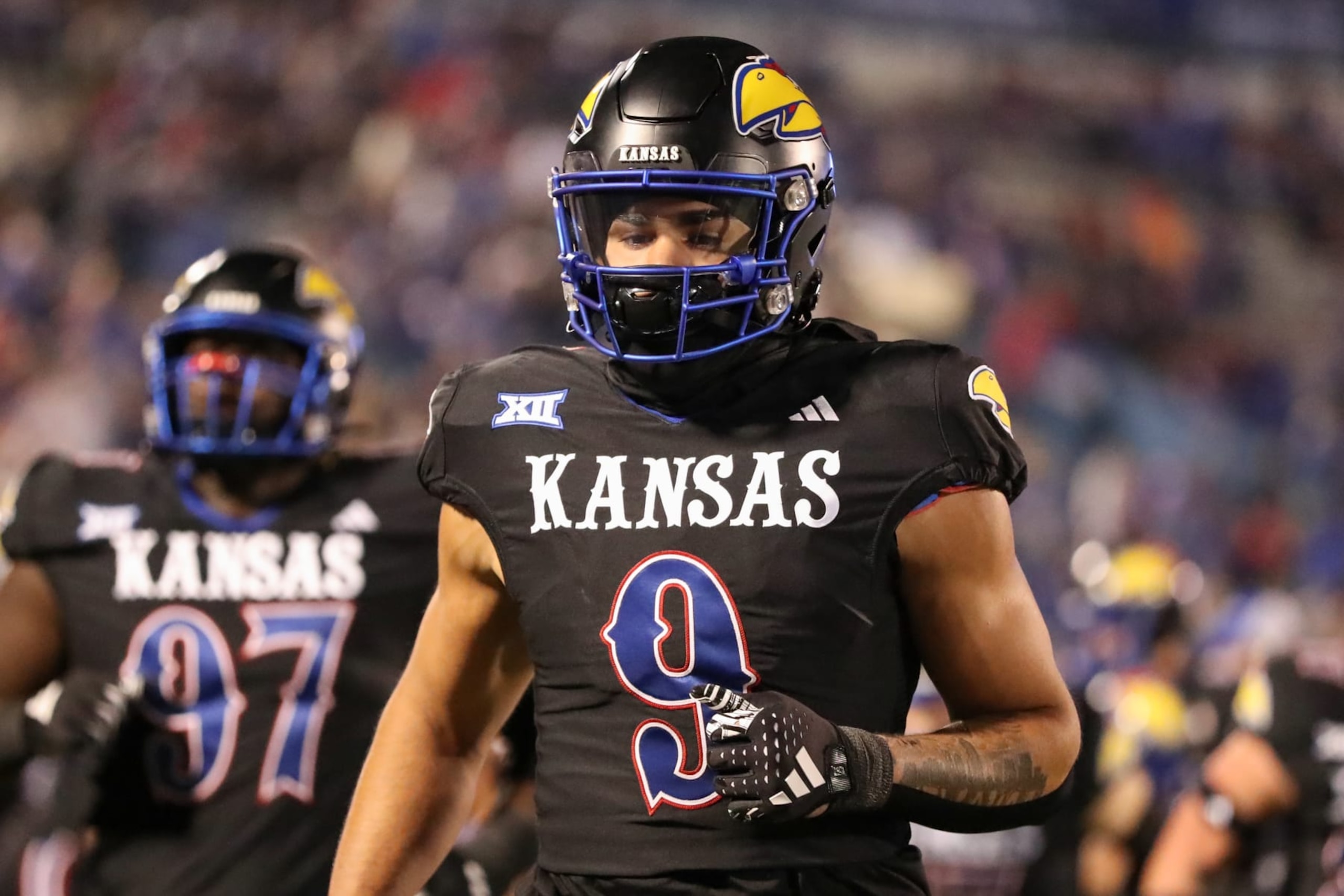 Kansas edge Austin Booker