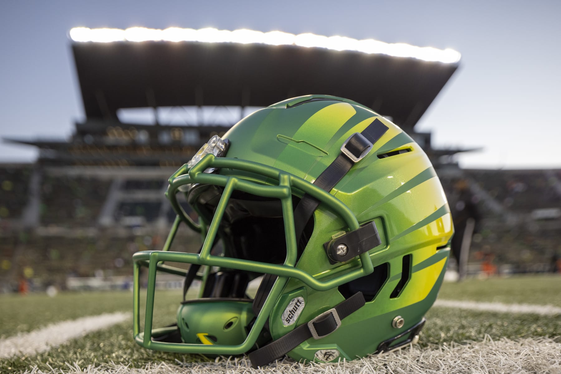EUGENE, OREGON - NOVEMBER 24: An Oregon Ducks helmet on the field at Autzen Stadium before the football game between the Oregon Ducks and the Oregon State Beavers at Autzen Stadium  November 24, 2023 in Eugene, Oregon. (Photo by Tom Hauck/Getty Images)