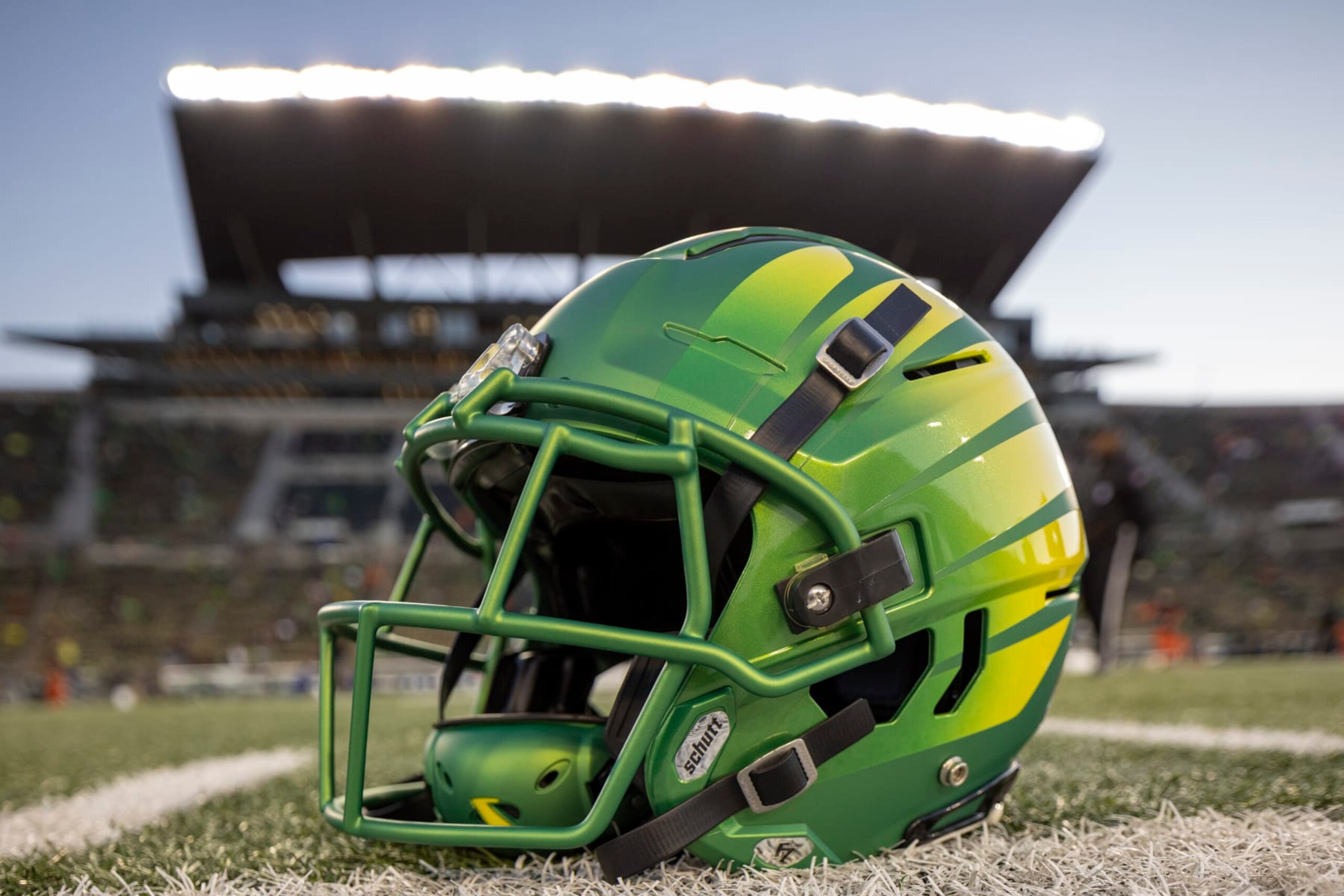 EUGENE, OREGON - NOVEMBER 24: An Oregon Ducks helmet on the field at Autzen Stadium before the football game between the Oregon Ducks and the Oregon State Beavers at Autzen Stadium  November 24, 2023 in Eugene, Oregon. (Photo by Tom Hauck/Getty Images)