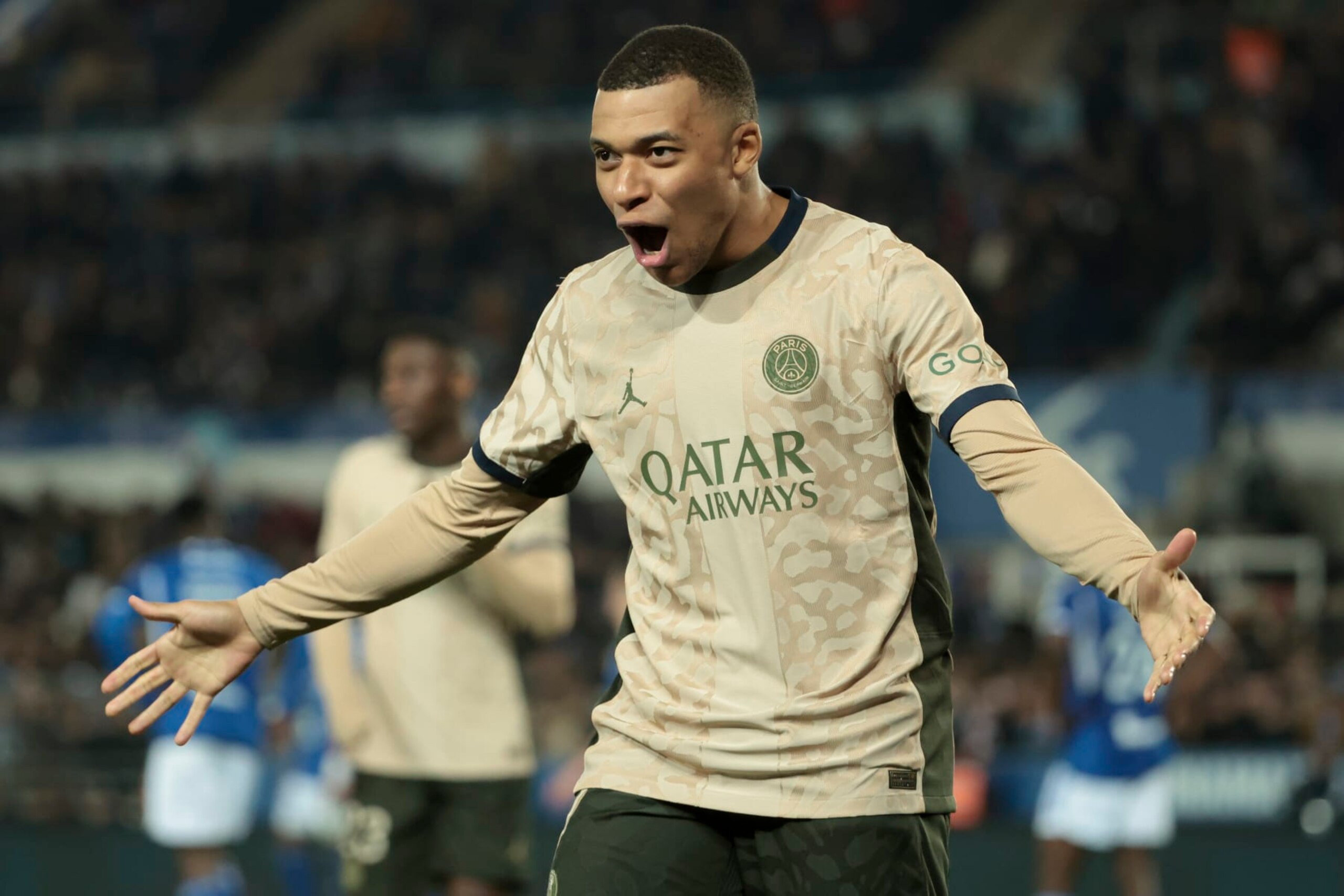 STRASBOURG, FRANCE - FEBRUARY 2: Kylian Mbappe of PSG celebrates the goal of Marco Asensio during the Ligue 1 Uber Eats match between RC Strasbourg Alsace (RCSA) and Paris Saint-Germain (PSG) at Stade de la Meinau on February 2, 2024 in Strasbourg, France. (Photo by Jean Catuffe/Getty Images)