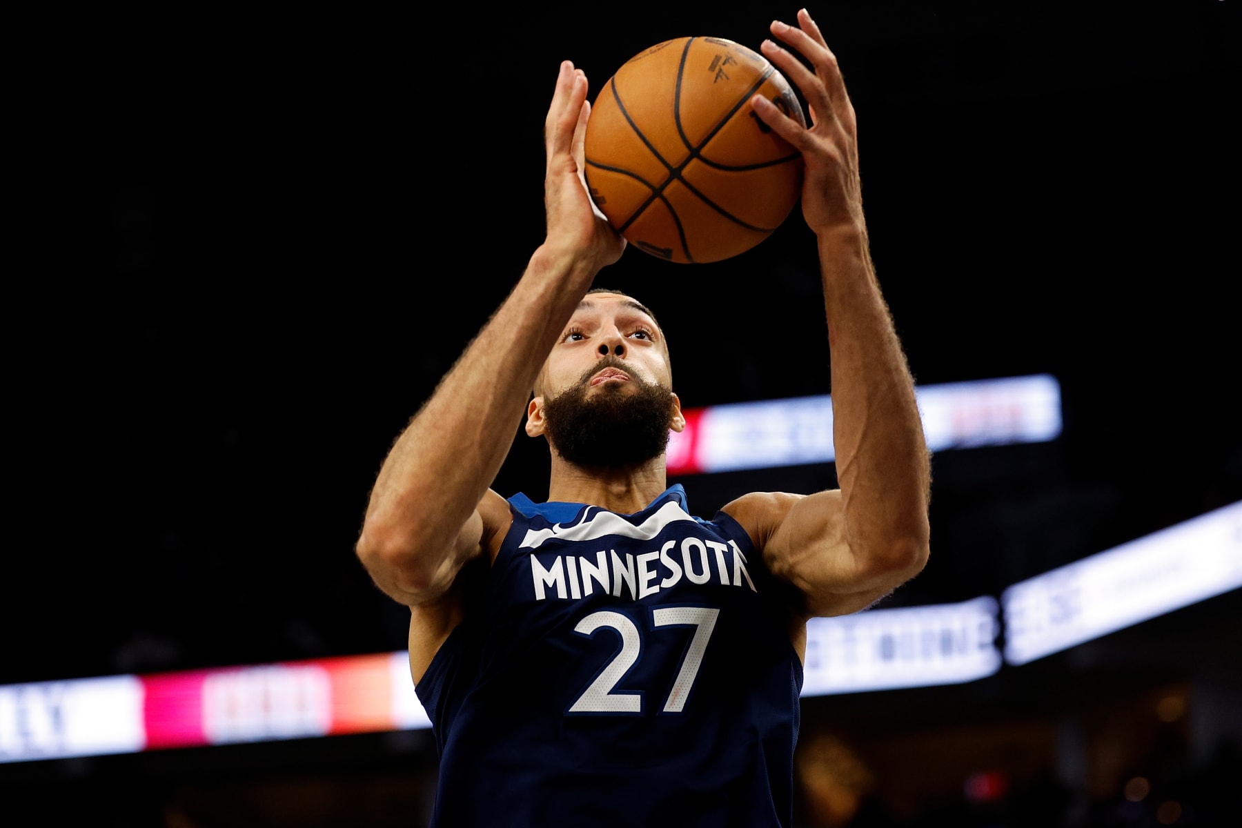 MINNEAPOLIS, MINNESOTA - FEBRUARY 02: Rudy Gobert #27 of the Minnesota Timberwolves rebounds the ball against the Orlando Magic in the fourth quarter at Target Center on February 02, 2024 in Minneapolis, Minnesota. The Magic defeated the Timberwolves 108-106. NOTE TO USER: User expressly acknowledges and agrees that, by downloading and or using this photograph, User is consenting to the terms and conditions of the Getty Images License Agreement. (Photo by David Berding/Getty Images)
