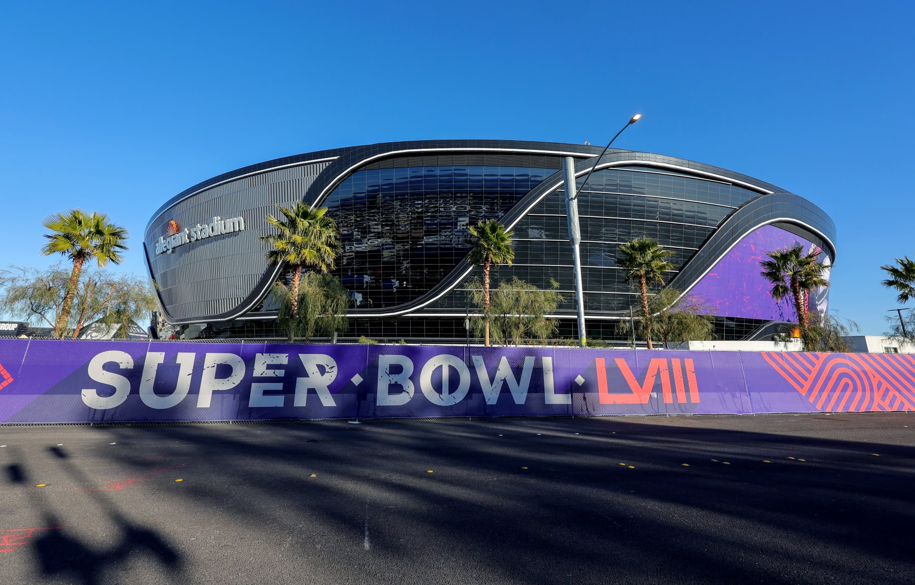 LAS VEGAS, NEVADA - JANUARY 30: An exterior view shows signage for Super Bowl LVIII on fencing around Allegiant Stadium on January 30, 2024 in Las Vegas, Nevada. The game will be played on February 11, 2024, between the Kansas City Chiefs and the San Francisco 49ers. (Photo by Ethan Miller/Getty Images)