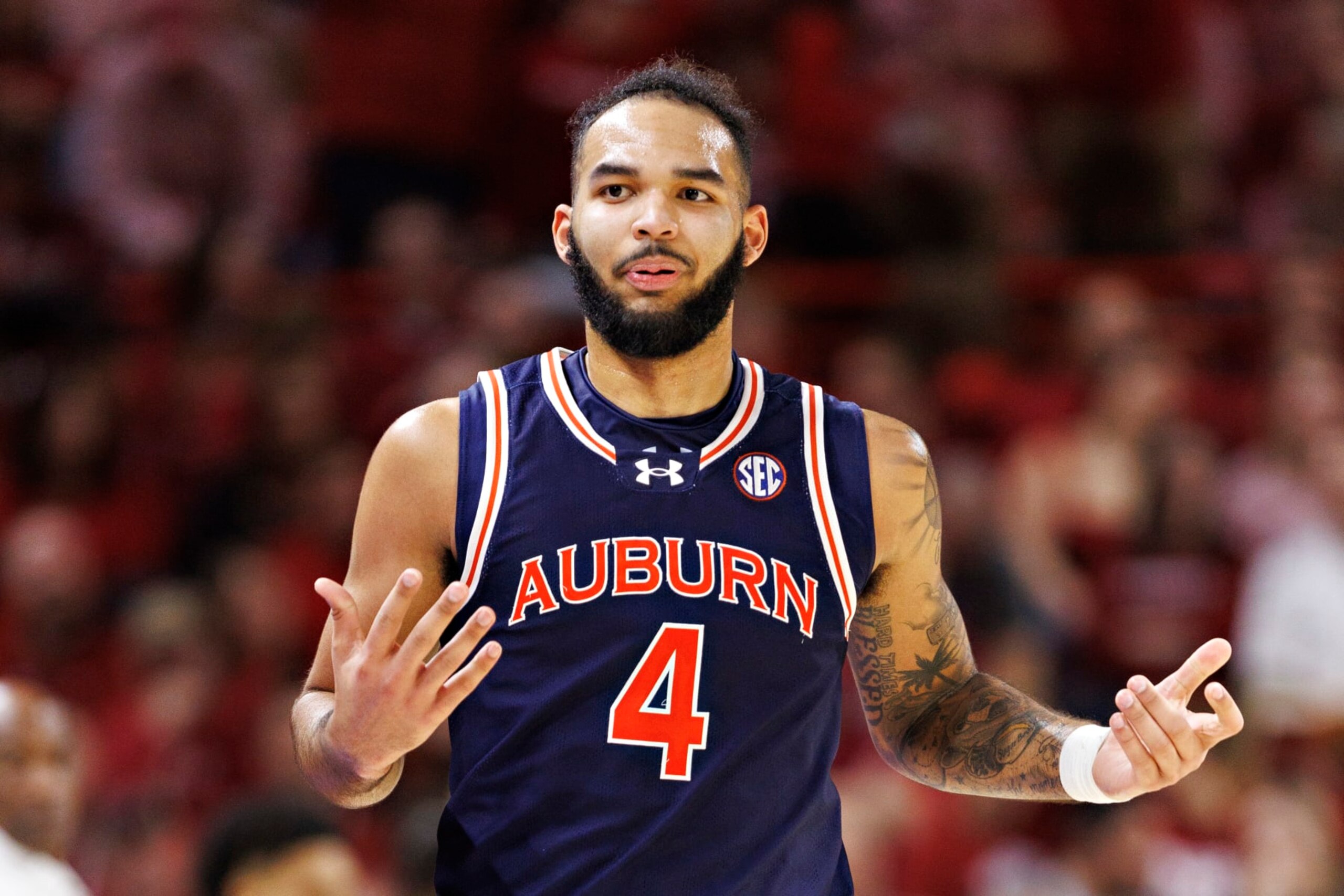 FAYETTEVILLE, ARKANSAS - JANUARY 06: Johni Broome #4 of the Auburn Tigers on the court during the game against the Arkansas Razorbacks at Bud Walton Arena on January 06, 2024 in Fayetteville, Arkansas. The Tigers defeated the Razorbacks 83-51. (Photo by Wesley Hitt/Getty Images)
