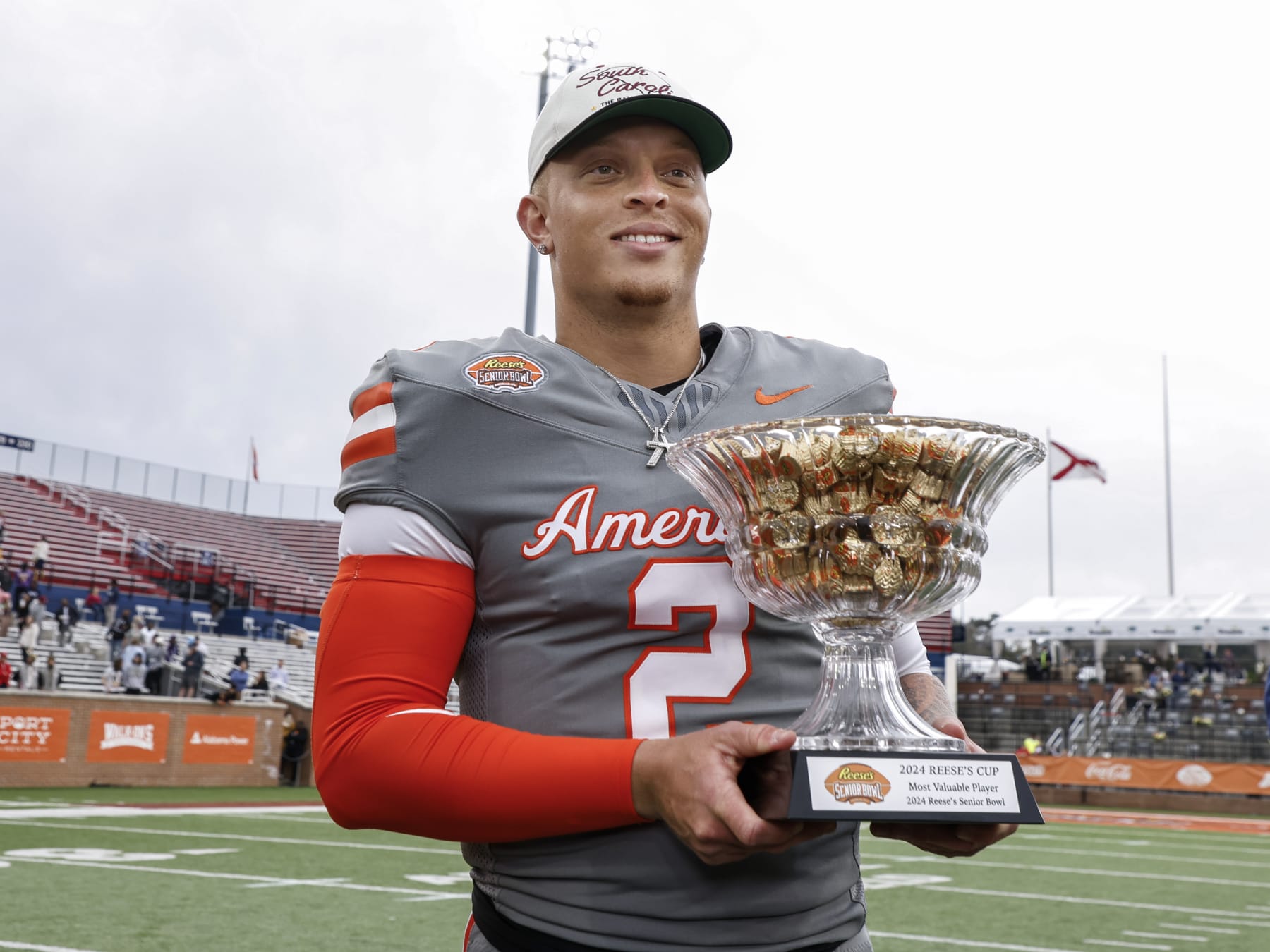 MOBILE, AL - FEBRUARY 03: Quarterback Spencer Rattler #2 of South Carolina from the American Team poses with the MVP award on the field after the 2024 Reese's Senior Bowl at Hancock Whitney Stadium on the campus of the University of South Alabama on February 3, 2024 in Mobile, Alabama. The National Team defeated the American Team 16 to 7. (Photo by Don Juan Moore/Getty Images)