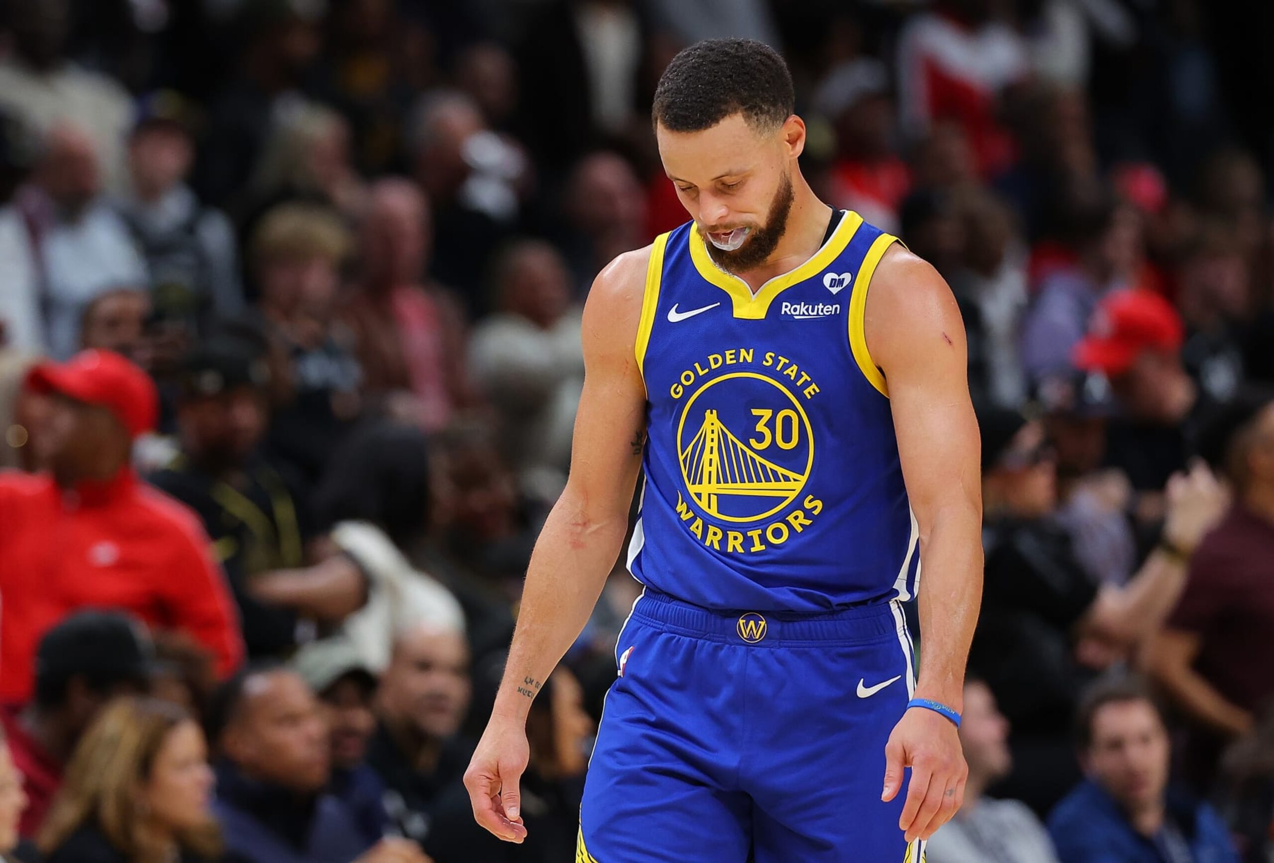 ATLANTA, GEORGIA - FEBRUARY 03:  Stephen Curry #30 of the Golden State Warriors reacts in the final seconds of their 141-134 overtime loss to the Atlanta Hawks at State Farm Arena on February 03, 2024 in Atlanta, Georgia.  NOTE TO USER: User expressly acknowledges and agrees that, by downloading and/or using this photograph, user is consenting to the terms and conditions of the Getty Images License Agreement.  (Photo by Kevin C. Cox/Getty Images)