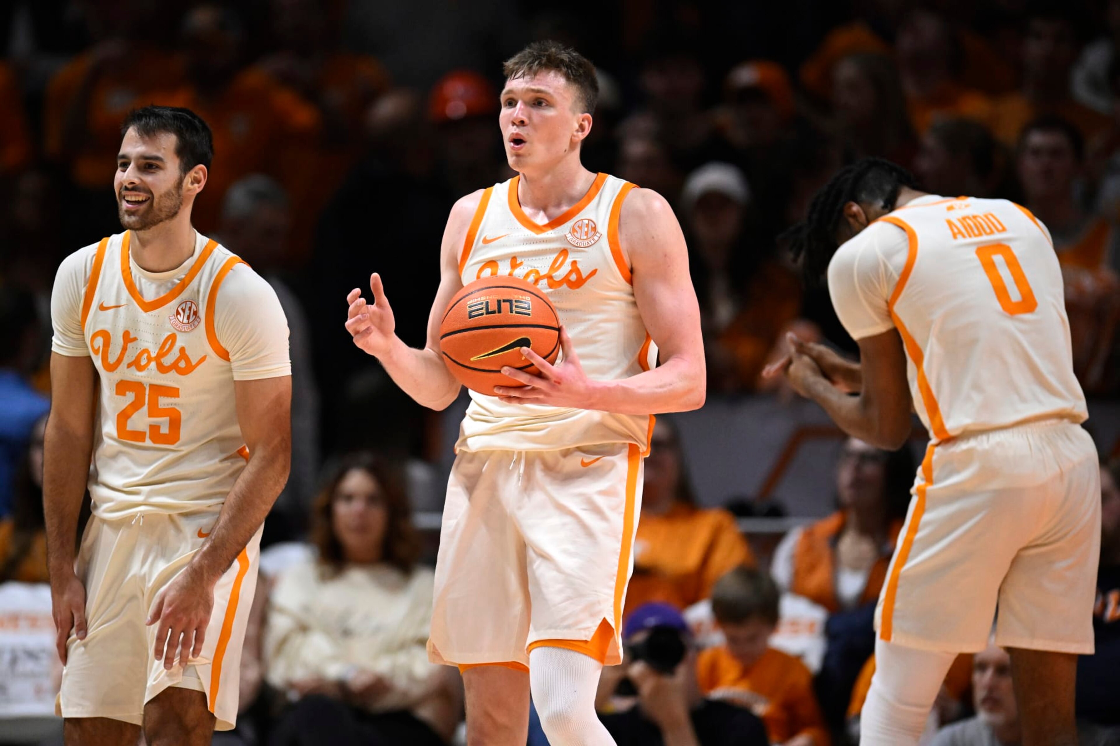 KNOXVILLE, TENNESSEE - JANUARY 30: Santiago Vescovi #25, Dalton Knecht #3, and Jonas Aidoo #0 of the Tennessee Volunteers react after a foul is called on Knecht against the South Carolina Gamecocks in the second half at Thompson-Boling Arena on January 30, 2024 in Knoxville, Tennessee. (Photo by Eakin Howard/Getty Images)