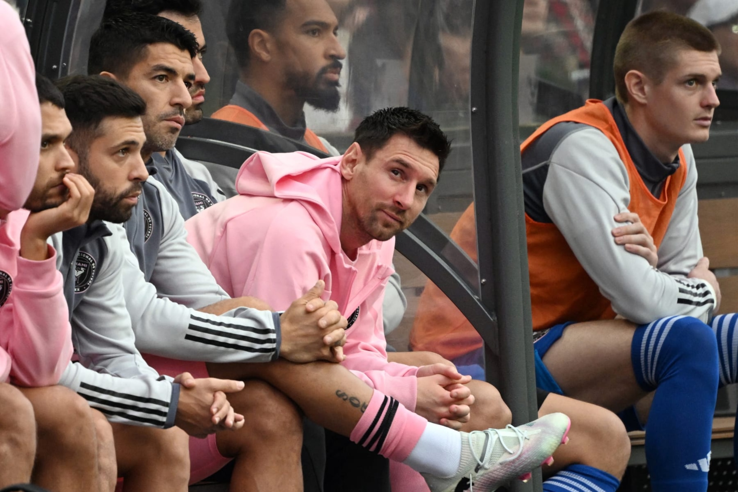 Inter Miami's Argentine forward Lionel Messi (C) sits on the bench during the friendly football match between Hong Kong XI and US Inter Miami CF in Hong Kong on February 4, 2024. Inter Miami were booed off the pitch after their injured superstar Lionel Messi failed to take the field in a pre-season friendly in Hong Kong. (Photo by Peter PARKS / AFP) (Photo by PETER PARKS/AFP via Getty Images) Inter Miami's Argentine forward Lionel Messi (C) sits on the bench during the friendly football match between Hong Kong XI and US Inter Miami CF in Hong Kong on February 4, 2024. Inter Miami were booed off the pitch after their injured superstar Lionel Messi failed to take the field in a pre-season friendly in Hong Kong. (Photo by Peter PARKS / AFP) (Photo by PETER PARKS/AFP via Getty Images)