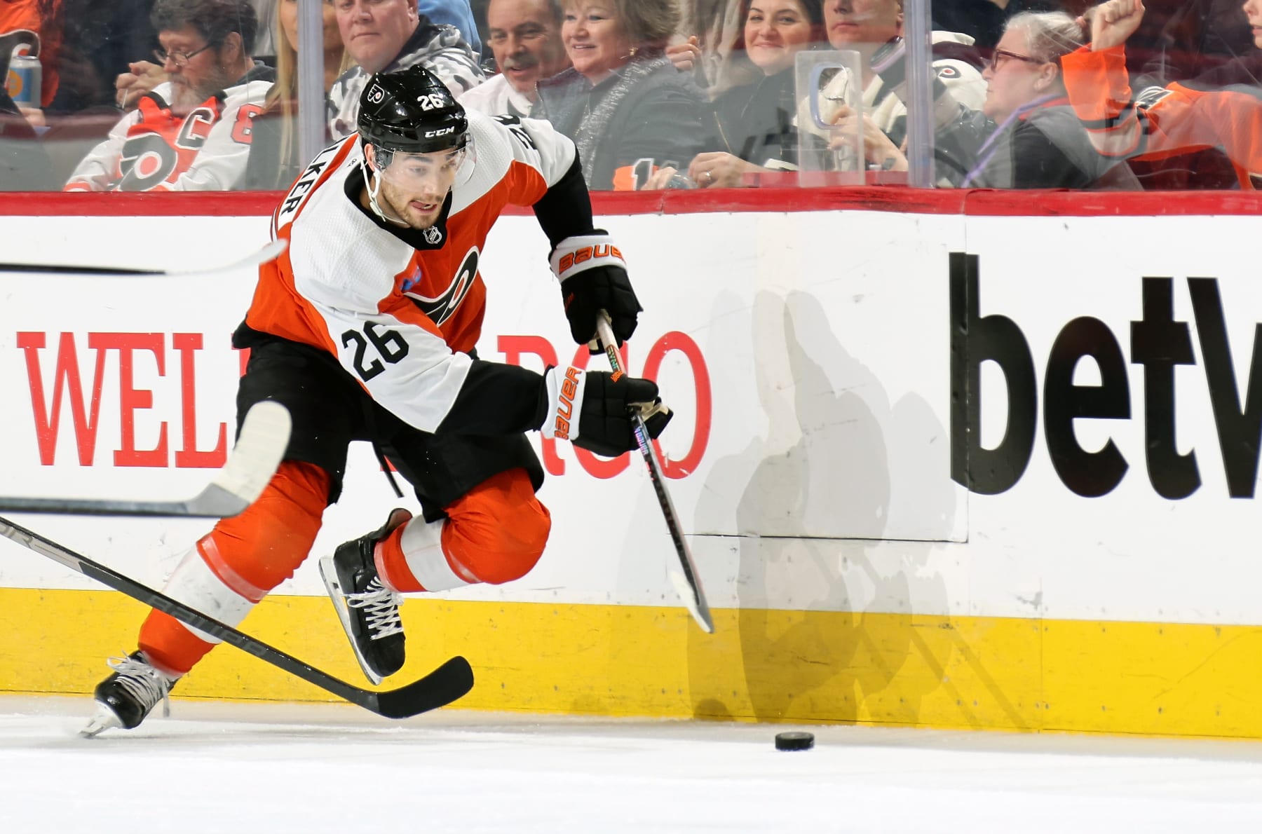 PHILADELPHIA, PENNSYLVANIA - JANUARY 23:  Sean Walker #26 of the Philadelphia Flyers skates the puck against the Tampa Bay Lightning at the Wells Fargo Center on January 23, 2024 in Philadelphia, Pennsylvania.  (Photo by Len Redkoles/NHLI via Getty Images)