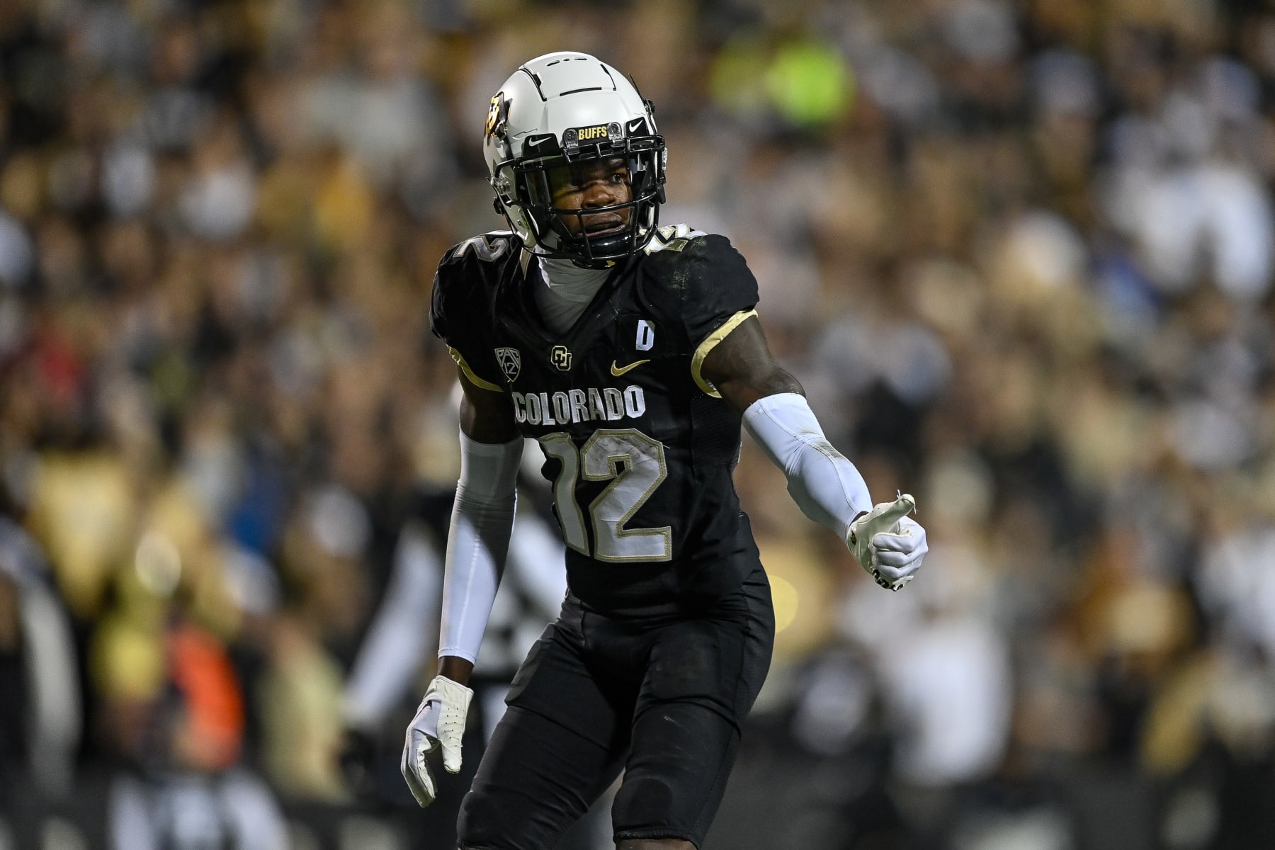 BOULDER, CO - NOVEMBER 4:  Cornerback Travis Hunter #12 of the Colorado Buffaloes lines up on defense against the Oregon State Beavers in the first half at Folsom Field on November 4, 2023 in Boulder, Colorado. (Photo by Dustin Bradford/Getty Images)