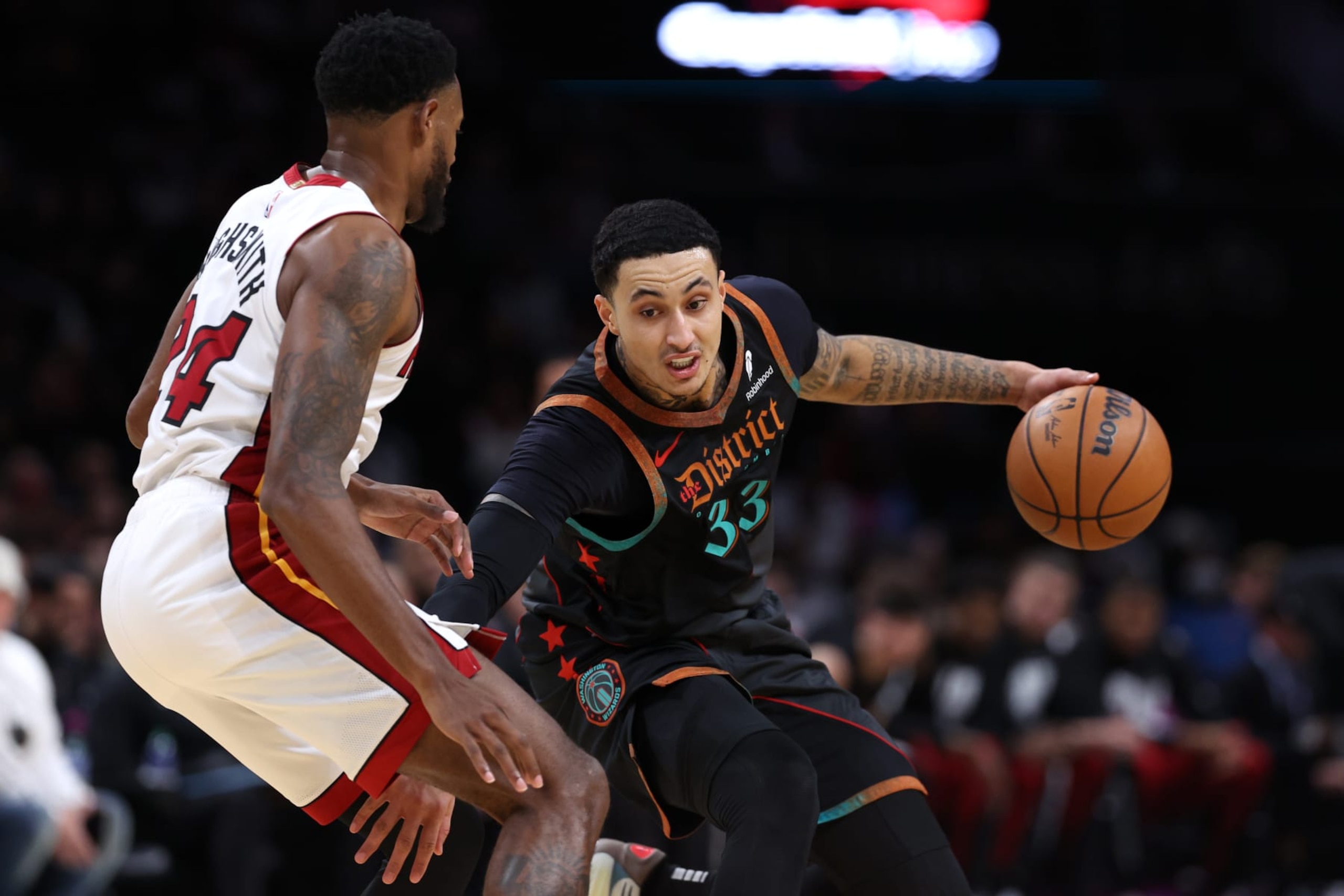 WASHINGTON, DC - FEBRUARY 02: Kyle Kuzma #33 of the Washington Wizards dribbles in front of Haywood Highsmith #24 of the Miami Heat during the first half at Capital One Arena on February 2, 2024 in Washington, DC. NOTE TO USER: User expressly acknowledges and agrees that, by downloading and or using this photograph, User is consenting to the terms and conditions of the Getty Images License Agreement. (Photo by Patrick Smith/Getty Images) WASHINGTON, DC - FEBRUARY 02: Kyle Kuzma #33 of the Washington Wizards dribbles in front of Haywood Highsmith #24 of the Miami Heat during the first half at Capital One Arena on February 2, 2024 in Washington, DC. NOTE TO USER: User expressly acknowledges and agrees that, by downloading and or using this photograph, User is consenting to the terms and conditions of the Getty Images License Agreement. (Photo by Patrick Smith/Getty Images)