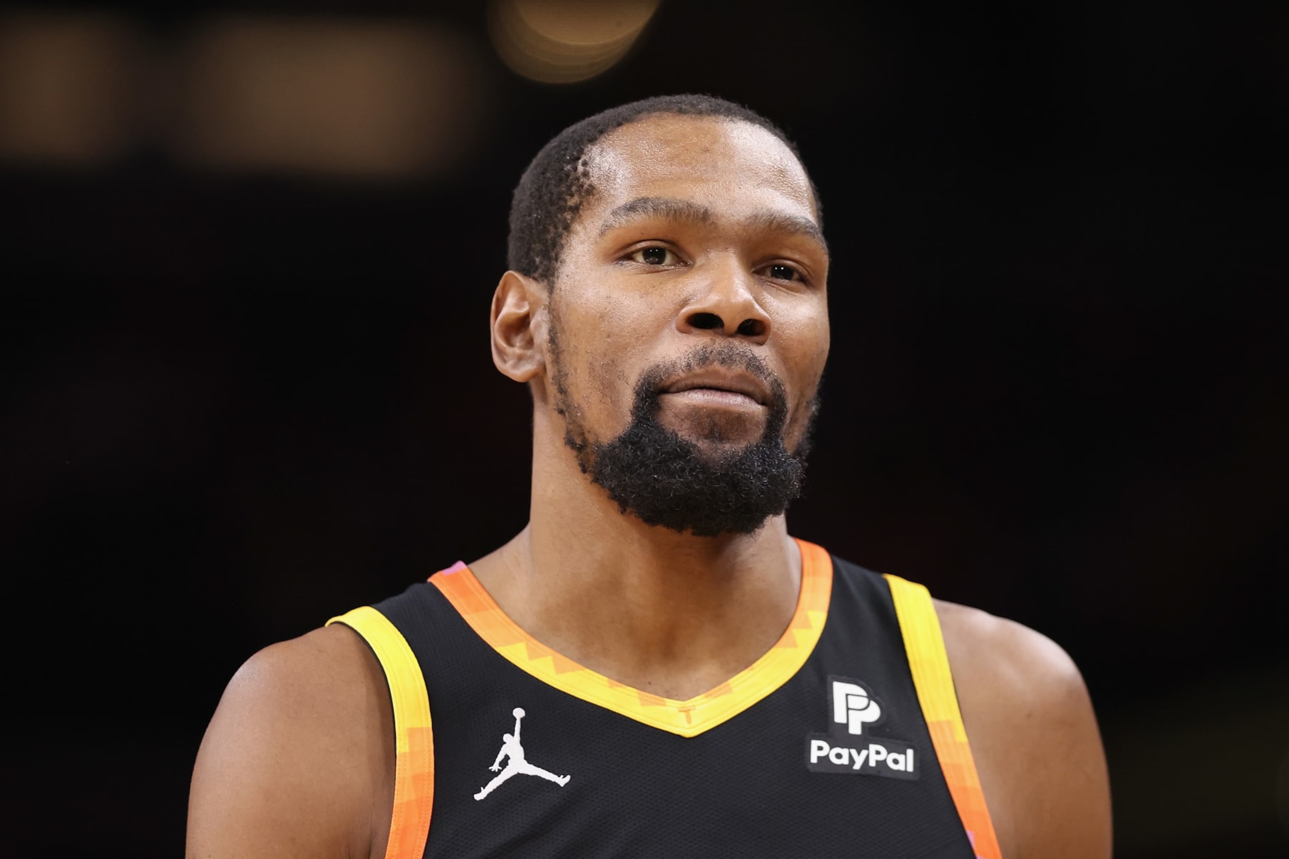 PHOENIX, ARIZONA - JANUARY 16: Kevin Durant #35 of the Phoenix Suns during the first half of the NBA game at Footprint Center on January 16, 2024 in Phoenix, Arizona. NOTE TO USER: User expressly acknowledges and agrees that, by downloading and or using this photograph, User is consenting to the terms and conditions of the Getty Images License Agreement.  (Photo by Christian Petersen/Getty Images)