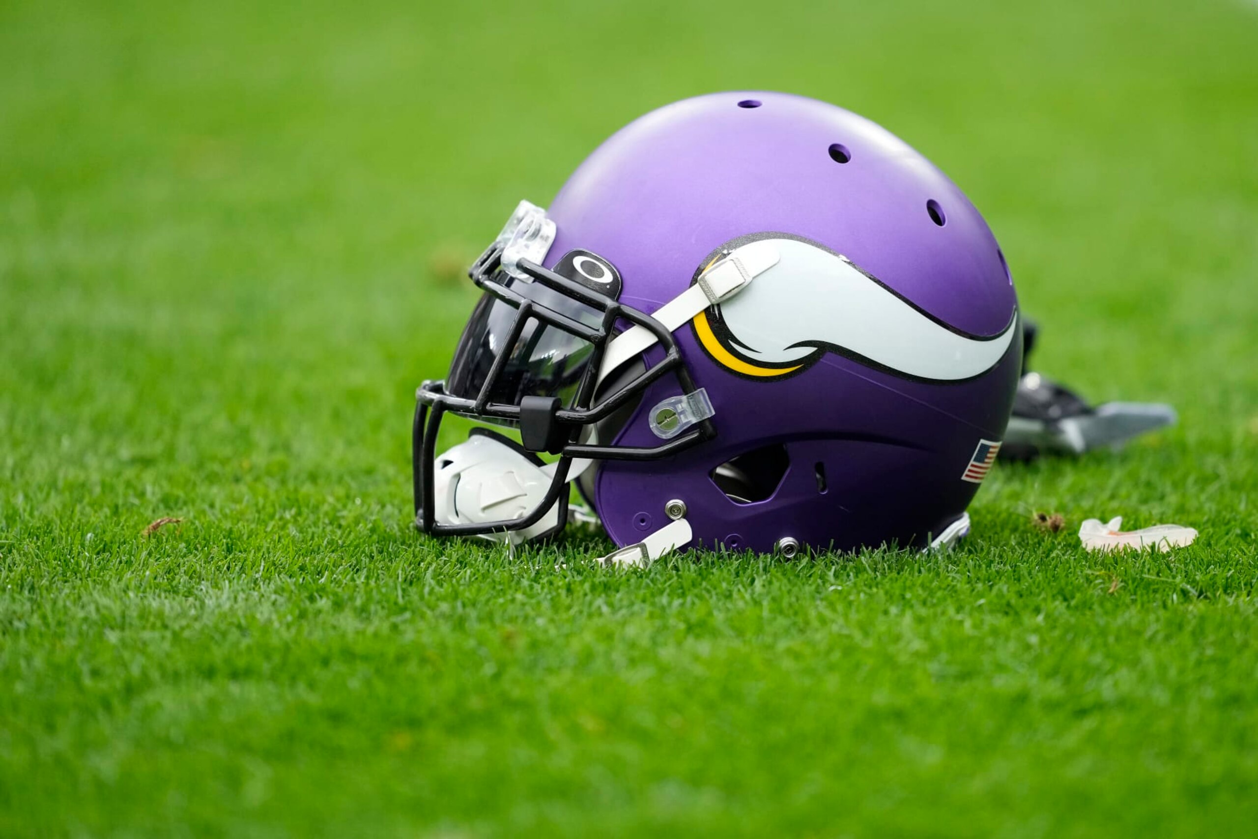 GREEN BAY, WISCONSIN - OCTOBER 29: A Minnesota Vikings helmet sits on the field before a game against the Green Bay Packers at Lambeau Field on October 29, 2023 in Green Bay, Wisconsin. (Photo by Patrick McDermott/Getty Images)