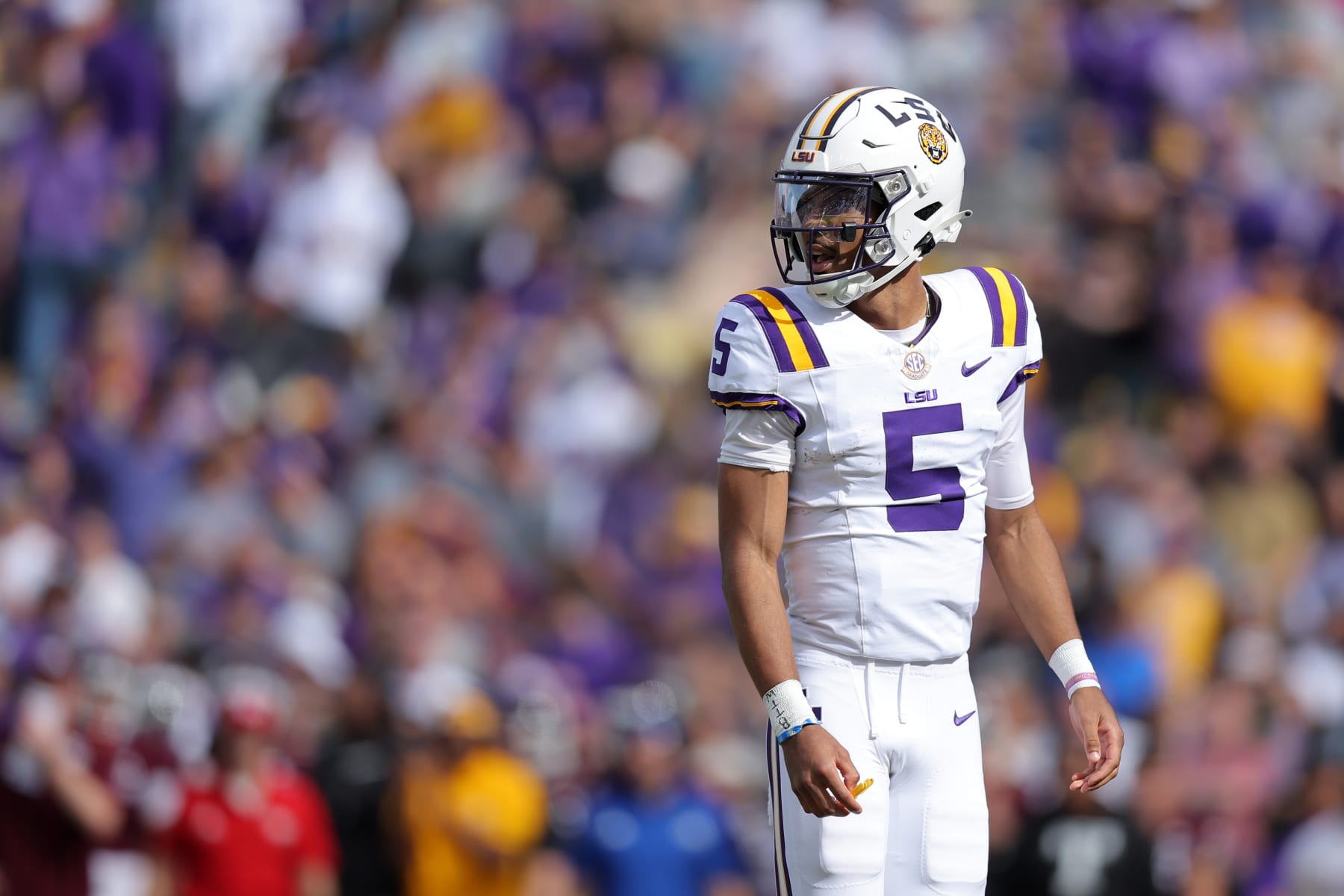 BATON ROUGE, LOUISIANA - NOVEMBER 25: Jayden Daniels #5 of the LSU Tigers reacts against the Texas A&M Aggies during a game at Tiger Stadium on November 25, 2023 in Baton Rouge, Louisiana. (Photo by Jonathan Bachman/Getty Images)