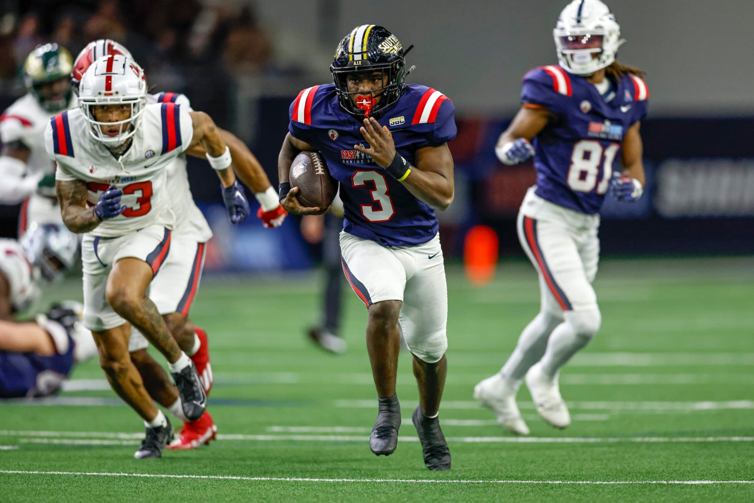 FRISCO, TX - FEBRUARY 01: West Team running back Frank Gore Jr. (3) runs through a hole in the line of scrimmage during the East-West Shrine Bowl on February 1, 2024 at the Ford Center at The Star in Frisco, Texas. (Photo by Matthew Pearce/Icon Sportswire via Getty Images)