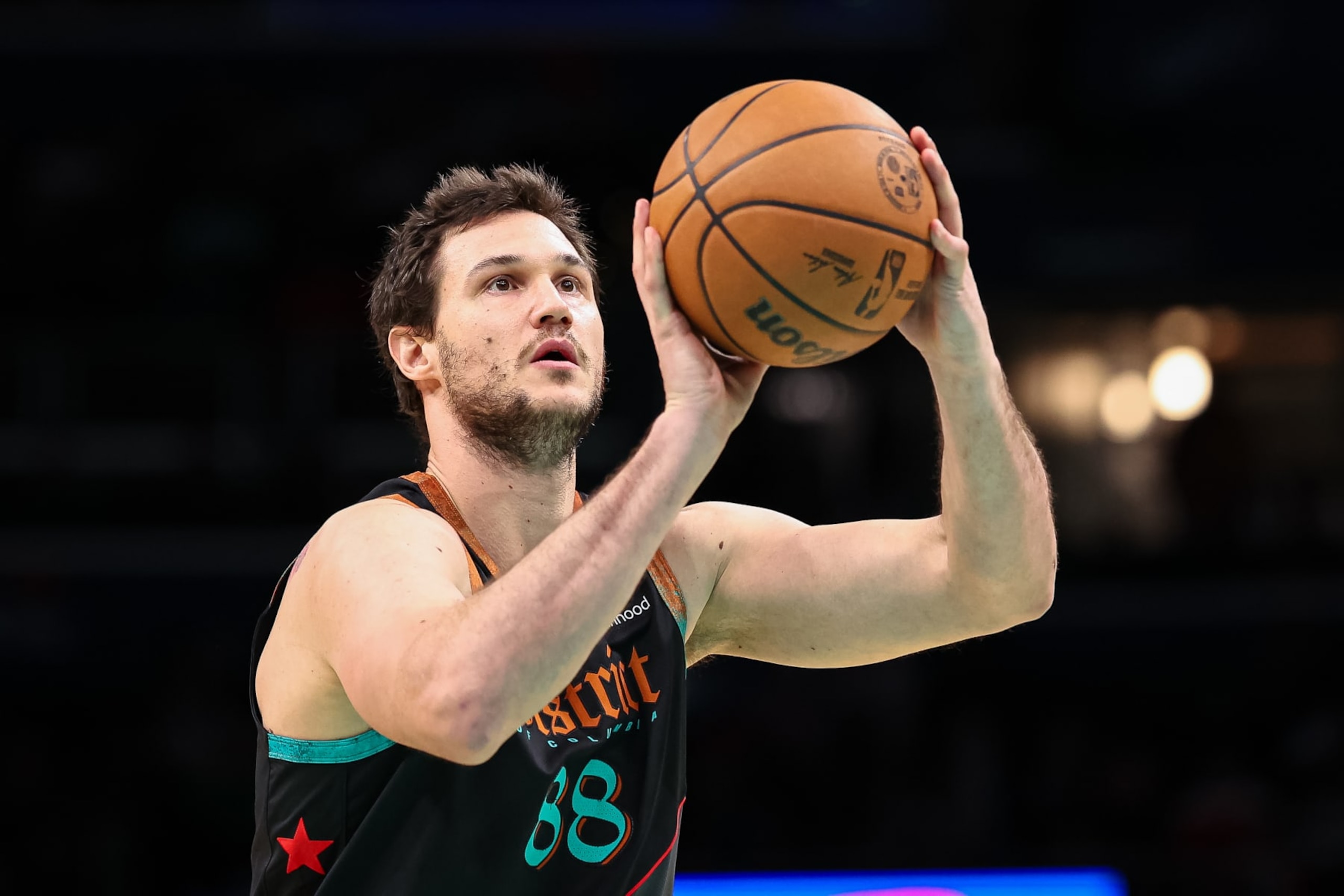 WASHINGTON, DC - DECEMBER 26: Danilo Gallinari #88 of the Washington Wizards shoots a free throw against the Orlando Magic during the second half at Capital One Arena on December 26, 2023 in Washington, DC. NOTE TO USER: User expressly acknowledges and agrees that, by downloading and or using this photograph, User is consenting to the terms and conditions of the Getty Images License Agreement. (Photo by Scott Taetsch/Getty Images) WASHINGTON, DC - DECEMBER 26: Danilo Gallinari #88 of the Washington Wizards shoots a free throw against the Orlando Magic during the second half at Capital One Arena on December 26, 2023 in Washington, DC. NOTE TO USER: User expressly acknowledges and agrees that, by downloading and or using this photograph, User is consenting to the terms and conditions of the Getty Images License Agreement. (Photo by Scott Taetsch/Getty Images)