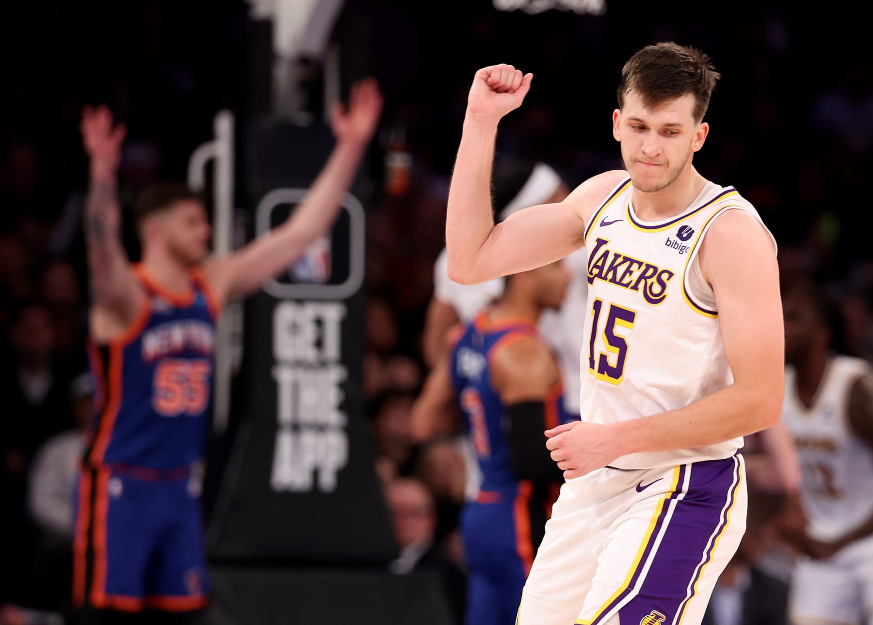 NEW YORK, NEW YORK - FEBRUARY 03:  Austin Reaves #15 of the Los Angeles Lakers celebrates a three point shot against the New York Knicks during their game at Madison Square Garden on February 03, 2024 in New York City.   User expressly acknowledges and agrees that, by downloading and or using this photograph, User is consenting to the terms and conditions of the Getty Images License Agreement.  (Photo by Al Bello/Getty Images)