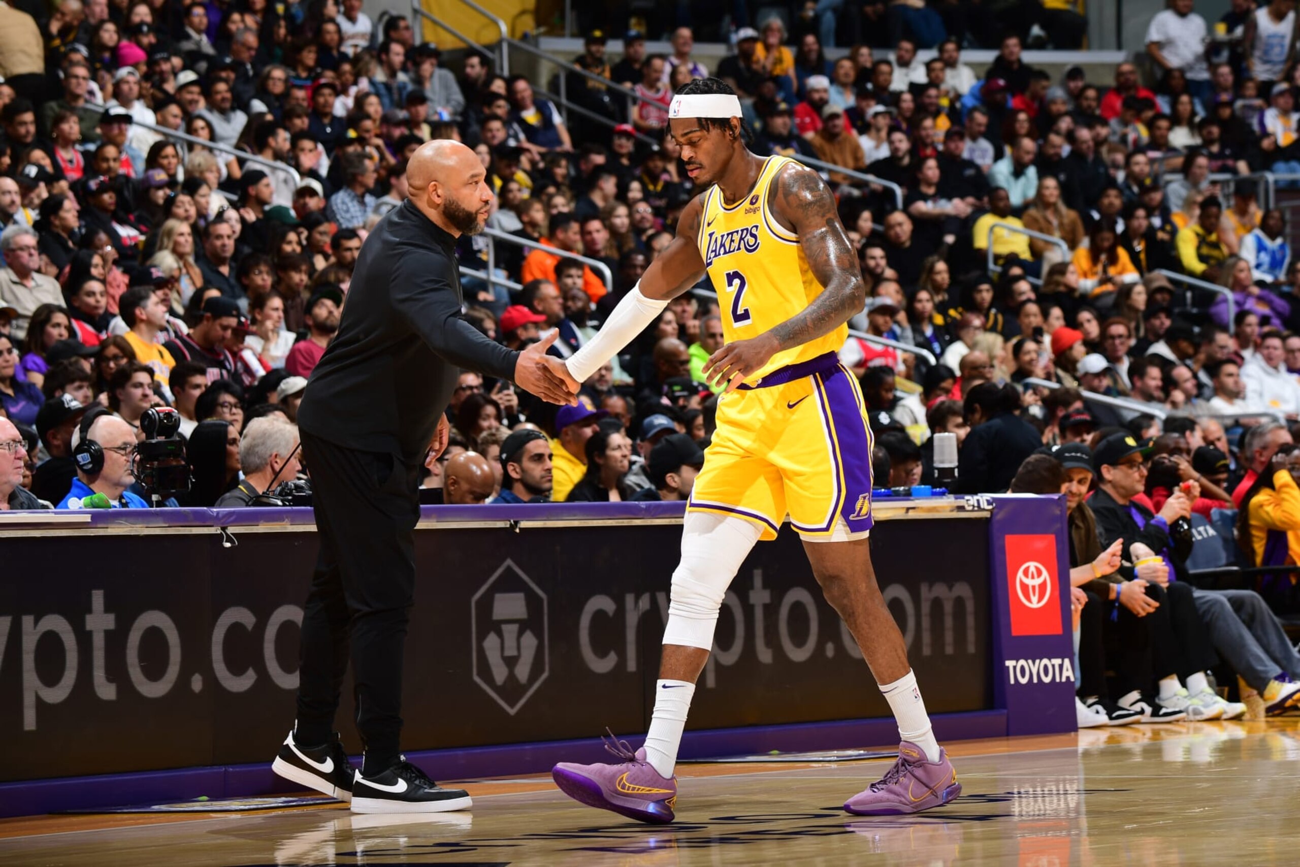 LOS ANGELES, CA - JANUARY 25: Jarred Vanderbilt #2 of the Los Angeles Lakers high fives Head Coach Darvin Ham during the game against the Chicago Bulls on January 25, 2024 at Crypto.Com Arena in Los Angeles, California. NOTE TO USER: User expressly acknowledges and agrees that, by downloading and/or using this Photograph, user is consenting to the terms and conditions of the Getty Images License Agreement. Mandatory Copyright Notice: Copyright 2024 NBAE (Photo by Adam Pantozzi/NBAE via Getty Images) LOS ANGELES, CA - JANUARY 25: Jarred Vanderbilt #2 of the Los Angeles Lakers high fives Head Coach Darvin Ham during the game against the Chicago Bulls on January 25, 2024 at Crypto.Com Arena in Los Angeles, California. NOTE TO USER: User expressly acknowledges and agrees that, by downloading and/or using this Photograph, user is consenting to the terms and conditions of the Getty Images License Agreement. Mandatory Copyright Notice: Copyright 2024 NBAE (Photo by Adam Pantozzi/NBAE via Getty Images)
