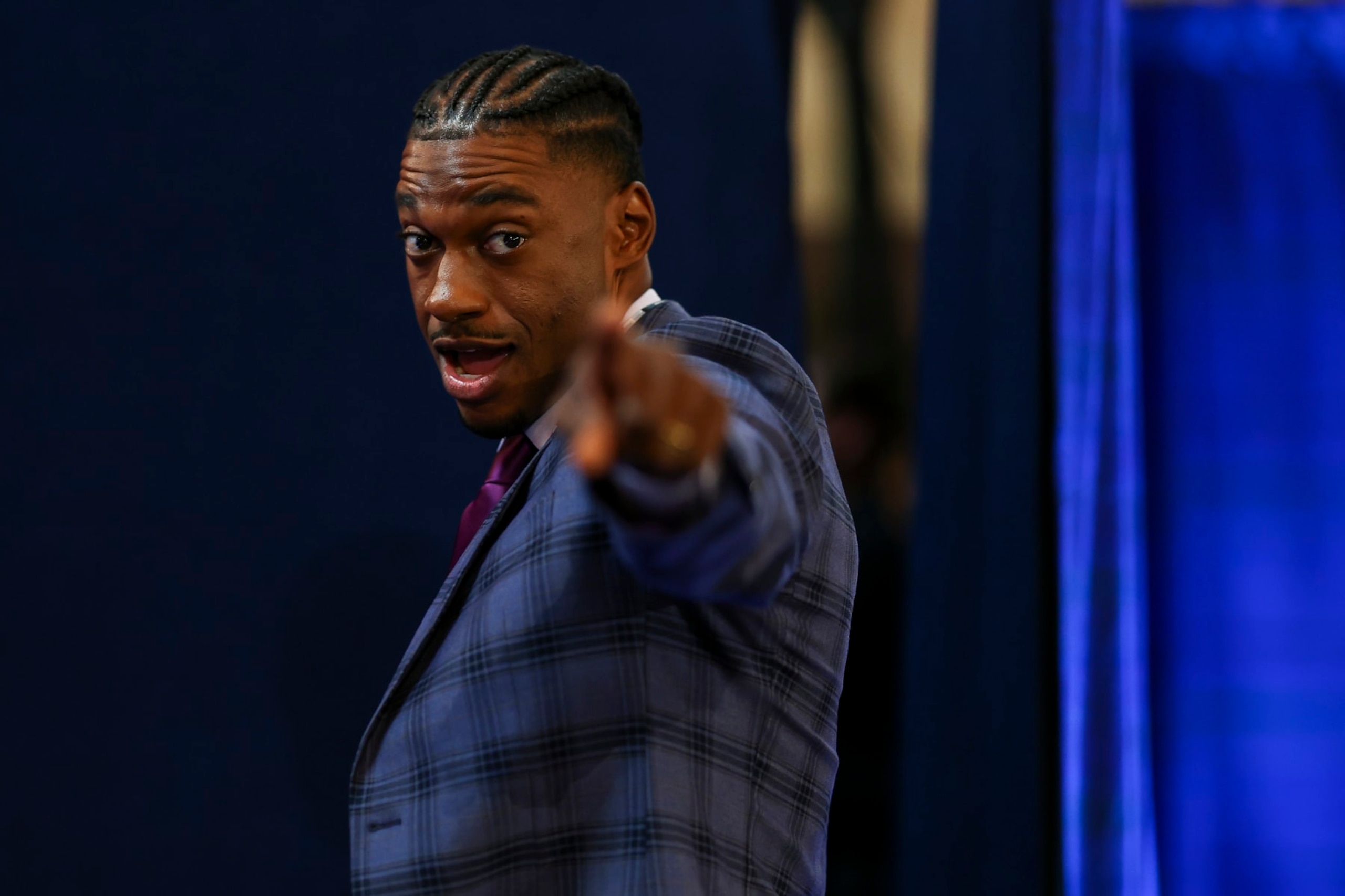 KANSAS CITY, MO - APRIL 27: ESPN NFL analyst Robert Griffin III smiles in the green room backstage during the first round of the 2023 NFL Draft at Union Station on April 27, 2023 in Kansas City, Missouri. (Photo by Kevin Sabitus/Getty Images)