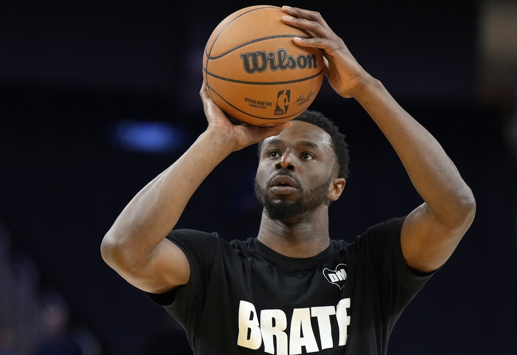 SAN FRANCISCO, CALIFORNIA - JANUARY 30: Andrew Wiggins #22 of the Golden State Warriors warms up prior to the start of an NBA basketball game against the Philadelphia 76ers at Chase Center on January 30, 2024 in San Francisco, California. NOTE TO USER: User expressly acknowledges and agrees that, by downloading and or using this photograph, User is consenting to the terms and conditions of the Getty Images License Agreement. (Photo by Thearon W. Henderson/Getty Images)