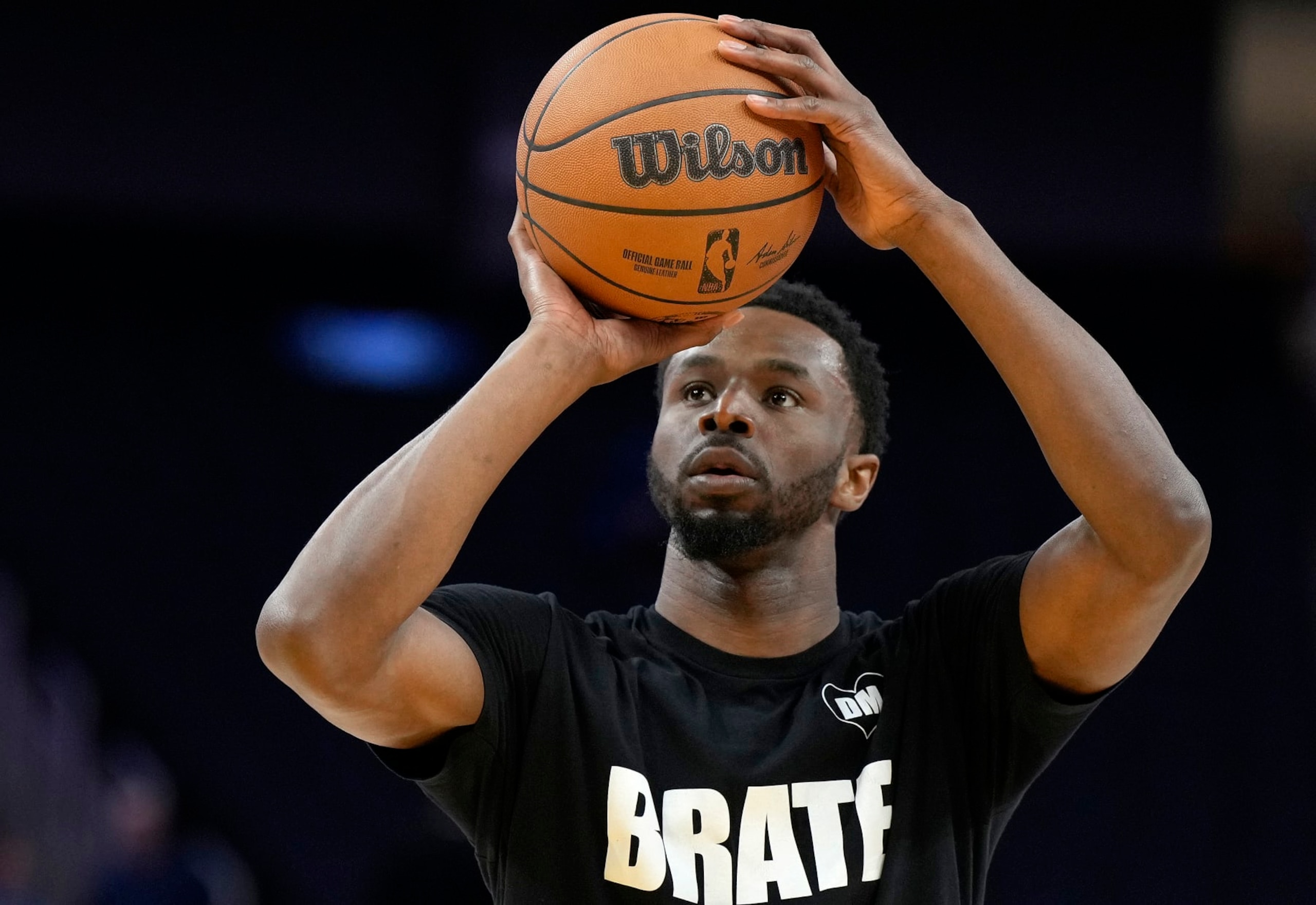 SAN FRANCISCO, CALIFORNIA - JANUARY 30: Andrew Wiggins #22 of the Golden State Warriors warms up prior to the start of an NBA basketball game against the Philadelphia 76ers at Chase Center on January 30, 2024 in San Francisco, California. NOTE TO USER: User expressly acknowledges and agrees that, by downloading and or using this photograph, User is consenting to the terms and conditions of the Getty Images License Agreement. (Photo by Thearon W. Henderson/Getty Images)