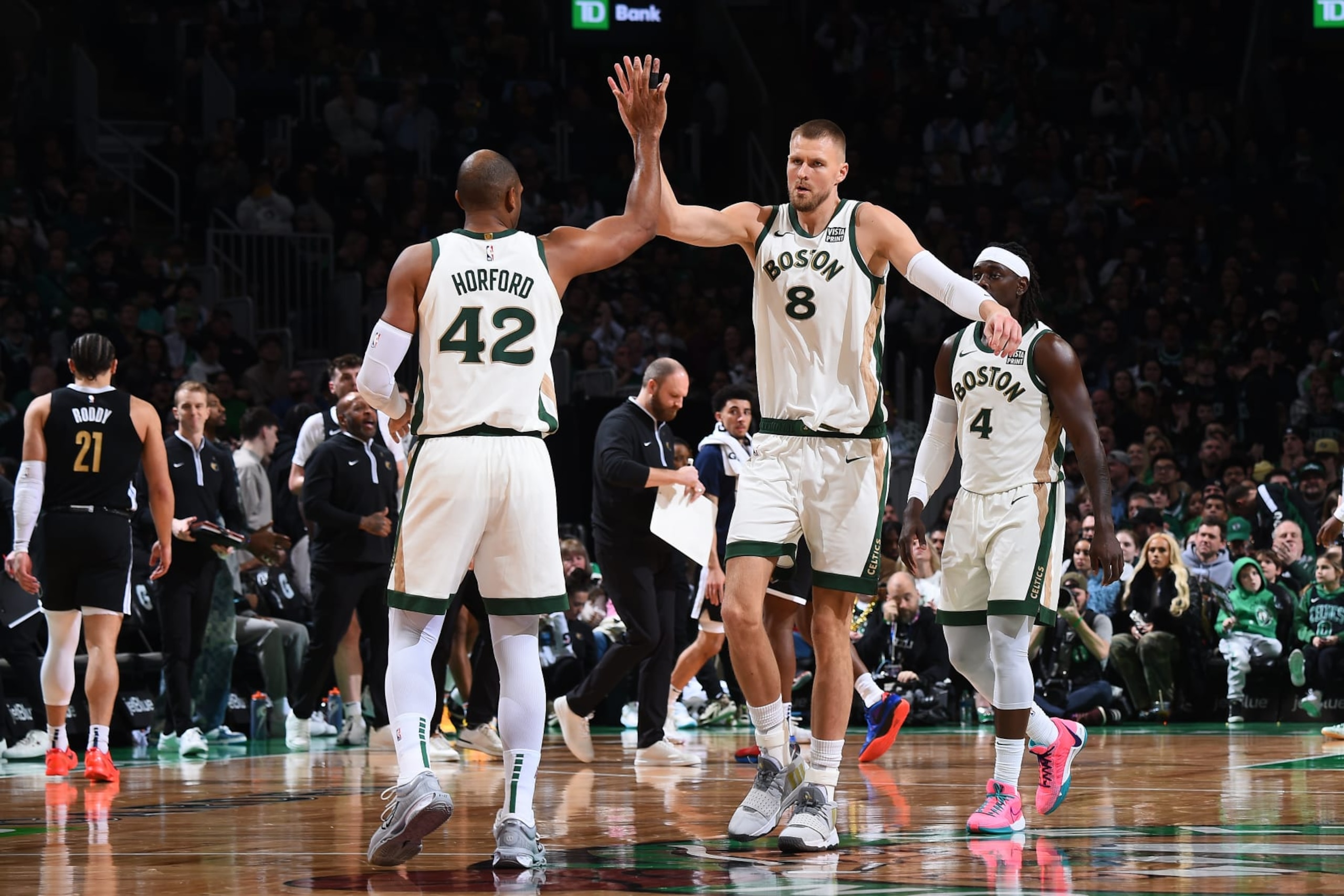 BOSTON, MA - FEBRUARY 4: Al Horford #42 high five during the game Kristaps Porzingis #8 of the Boston Celtics during the game against the Memphis Grizzlies on February 4, 2024 at the TD Garden in Boston, Massachusetts. NOTE TO USER: User expressly acknowledges and agrees that, by downloading and or using this photograph, User is consenting to the terms and conditions of the Getty Images License Agreement. Mandatory Copyright Notice: Copyright 2024 NBAE (Photo by Brian Babineau/NBAE via Getty Images) BOSTON, MA - FEBRUARY 4: Al Horford #42 high five during the game Kristaps Porzingis #8 of the Boston Celtics during the game against the Memphis Grizzlies on February 4, 2024 at the TD Garden in Boston, Massachusetts. NOTE TO USER: User expressly acknowledges and agrees that, by downloading and or using this photograph, User is consenting to the terms and conditions of the Getty Images License Agreement. Mandatory Copyright Notice: Copyright 2024 NBAE (Photo by Brian Babineau/NBAE via Getty Images)