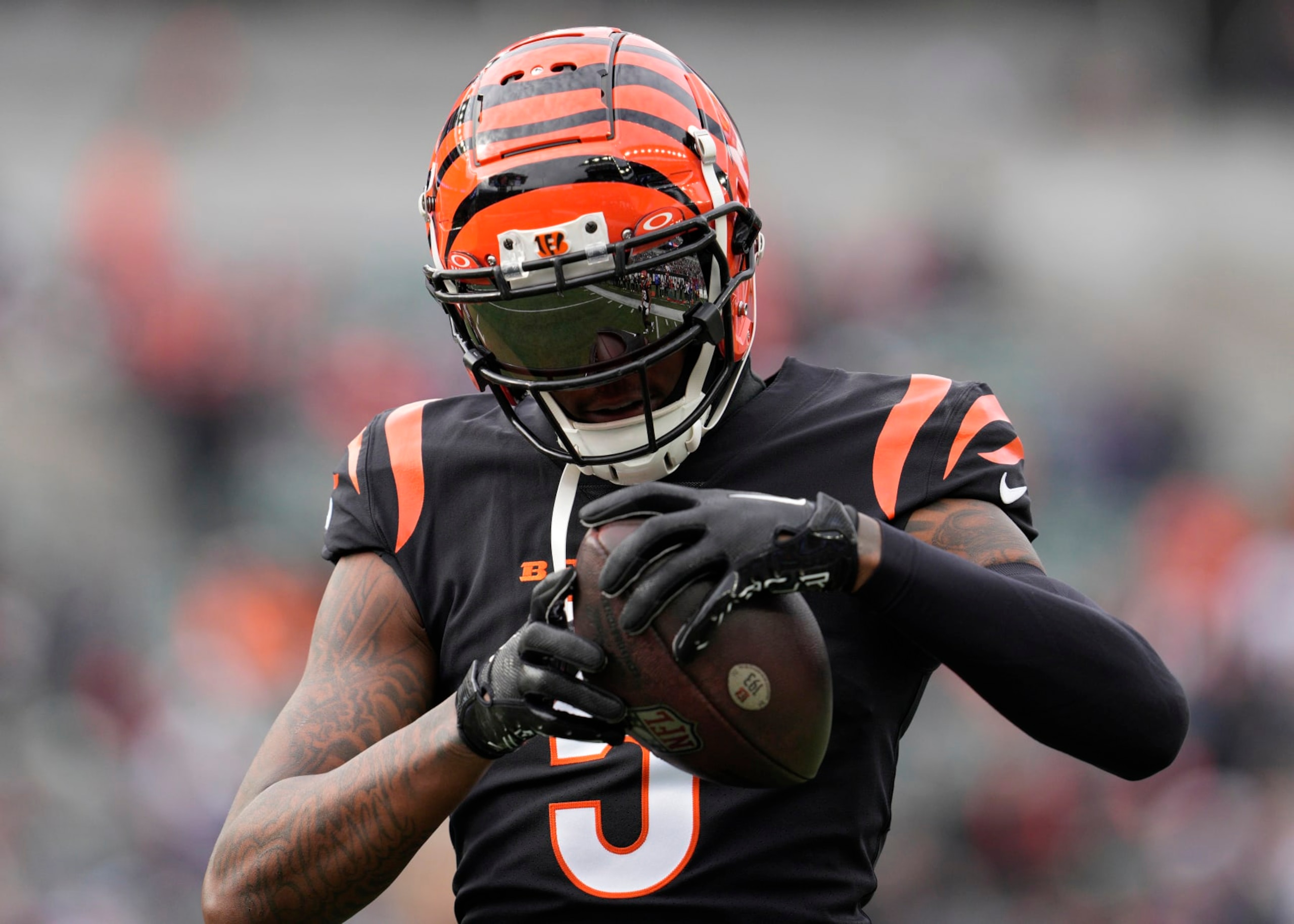 CINCINNATI, OHIO - DECEMBER 16: Tee Higgins #5 of the Cincinnati Bengals warms up prior to a NFL football game against the Minnesota Vikings at Paycor Stadium on December 16, 2023 in Cincinnati, Ohio. (Photo by Jeff Dean/Getty Images)