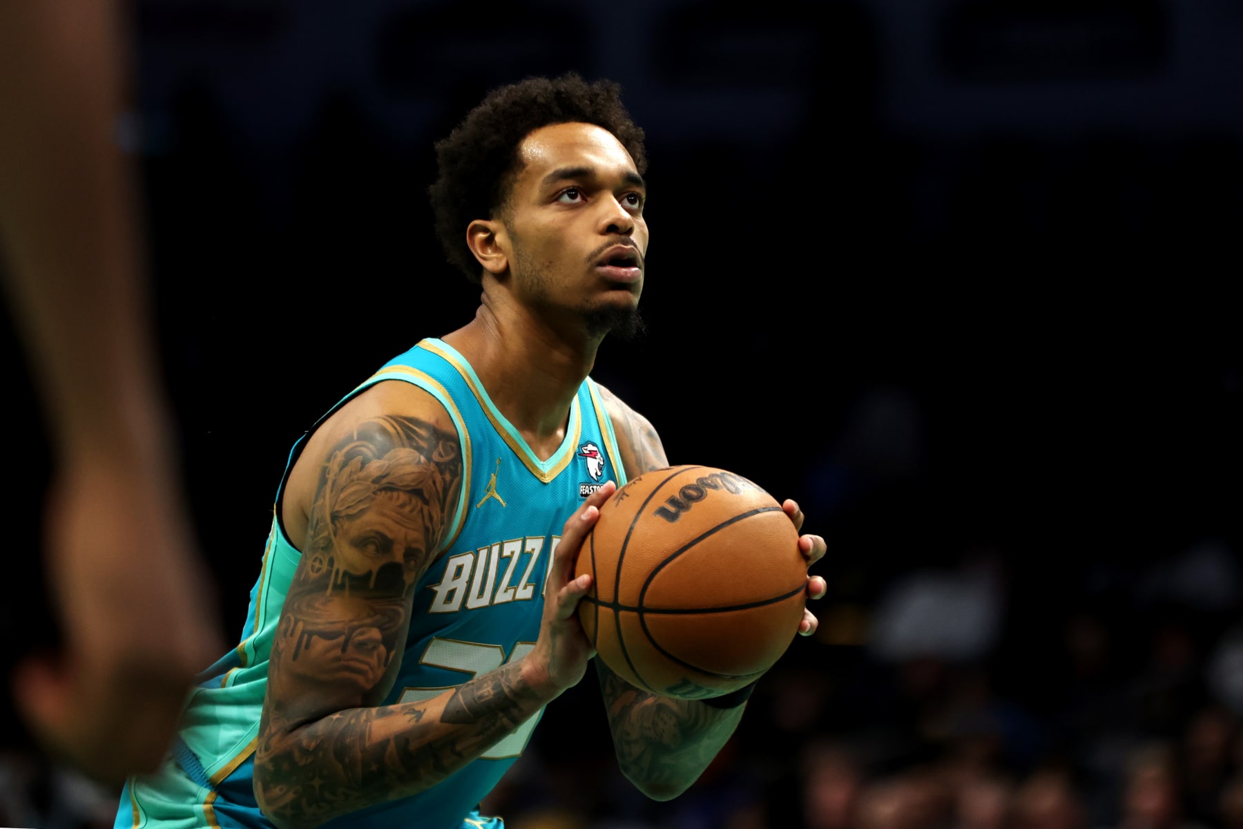 CHARLOTTE, NORTH CAROLINA - FEBRUARY 04: P.J. Washington #25 of the Charlotte Hornets shoots a free throw during the second half against the Indiana Pacers at Spectrum Center on February 04, 2024 in Charlotte, North Carolina. NOTE TO USER: User expressly acknowledges and agrees that, by downloading and or using this photograph, User is consenting to the terms and conditions of the Getty Images License Agreement. (Photo by David Jensen/Getty Images)