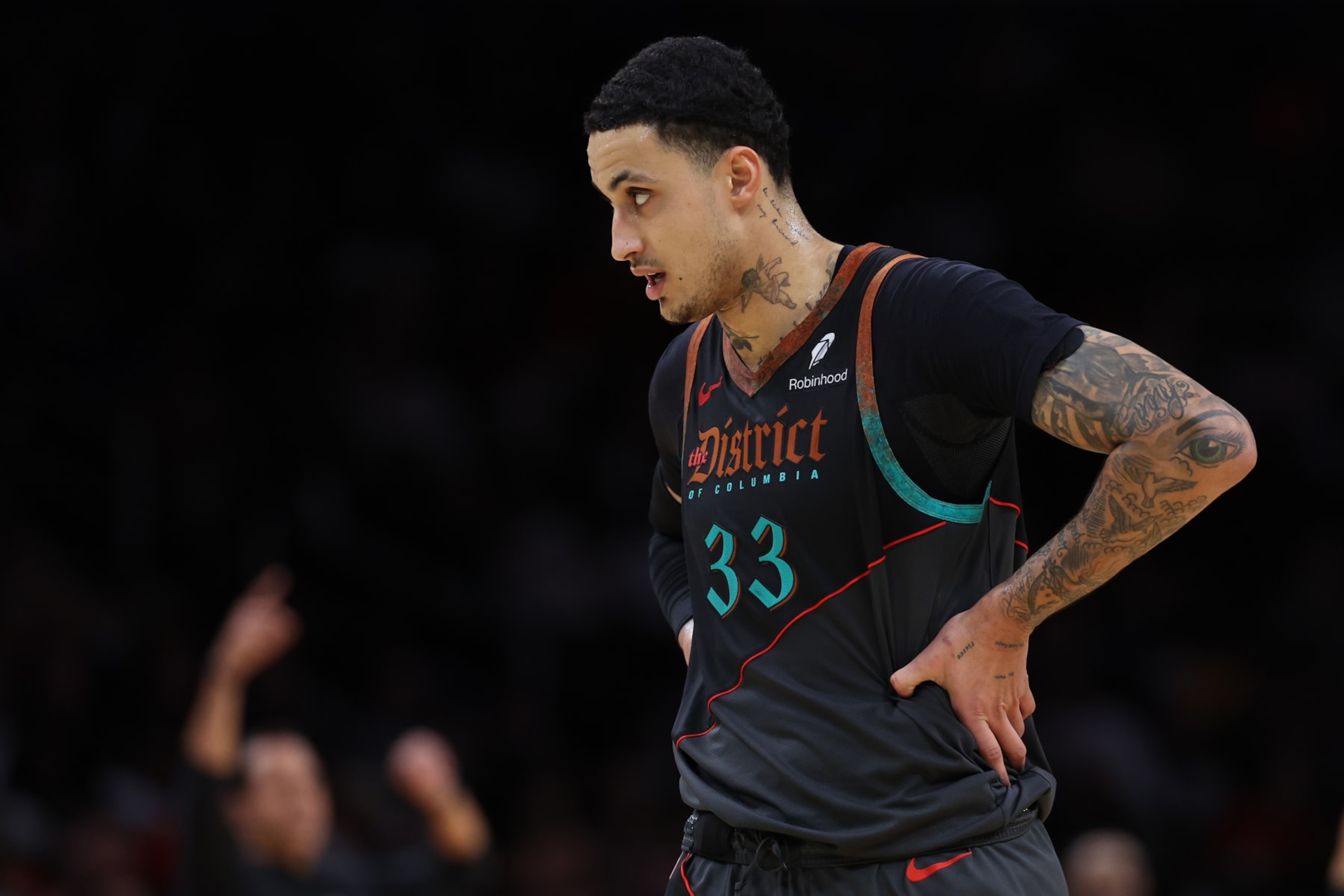 WASHINGTON, DC - FEBRUARY 02: Kyle Kuzma #33 of the Washington Wizards reacts against the Miami Heat during the first half at Capital One Arena on February 2, 2024 in Washington, DC. NOTE TO USER: User expressly acknowledges and agrees that, by downloading and or using this photograph, User is consenting to the terms and conditions of the Getty Images License Agreement. (Photo by Patrick Smith/Getty Images)