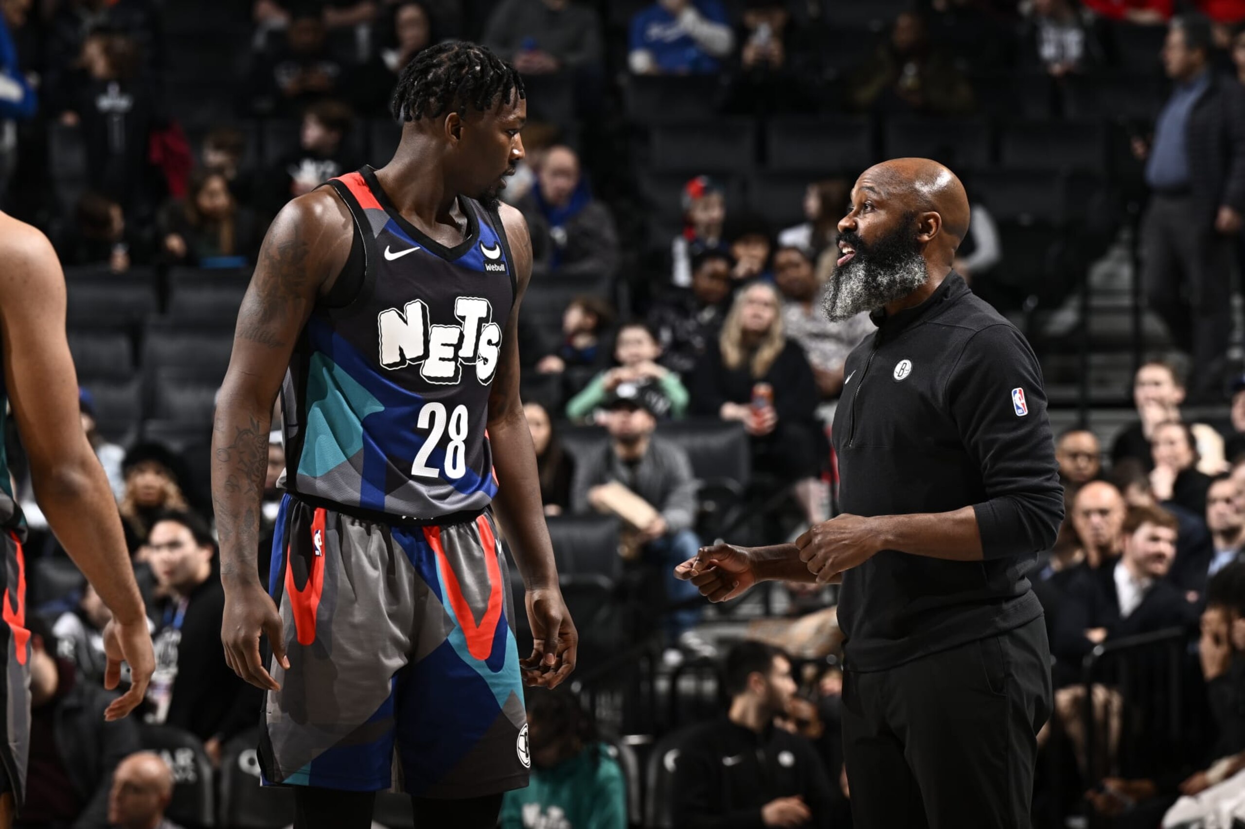 BROOKLYN, NY - JANUARY 27: Dorian Finney-Smith #28 talks to Jacque Vaughn of the Brooklyn Nets during the game against the Houston Rockets on January 27, 2024 at Barclays Center in Brooklyn, New York. NOTE TO USER: User expressly acknowledges and agrees that, by downloading and or using this Photograph, user is consenting to the terms and conditions of the Getty Images License Agreement. Mandatory Copyright Notice: Copyright 2024 NBAE (Photo by David Dow/NBAE via Getty Images)