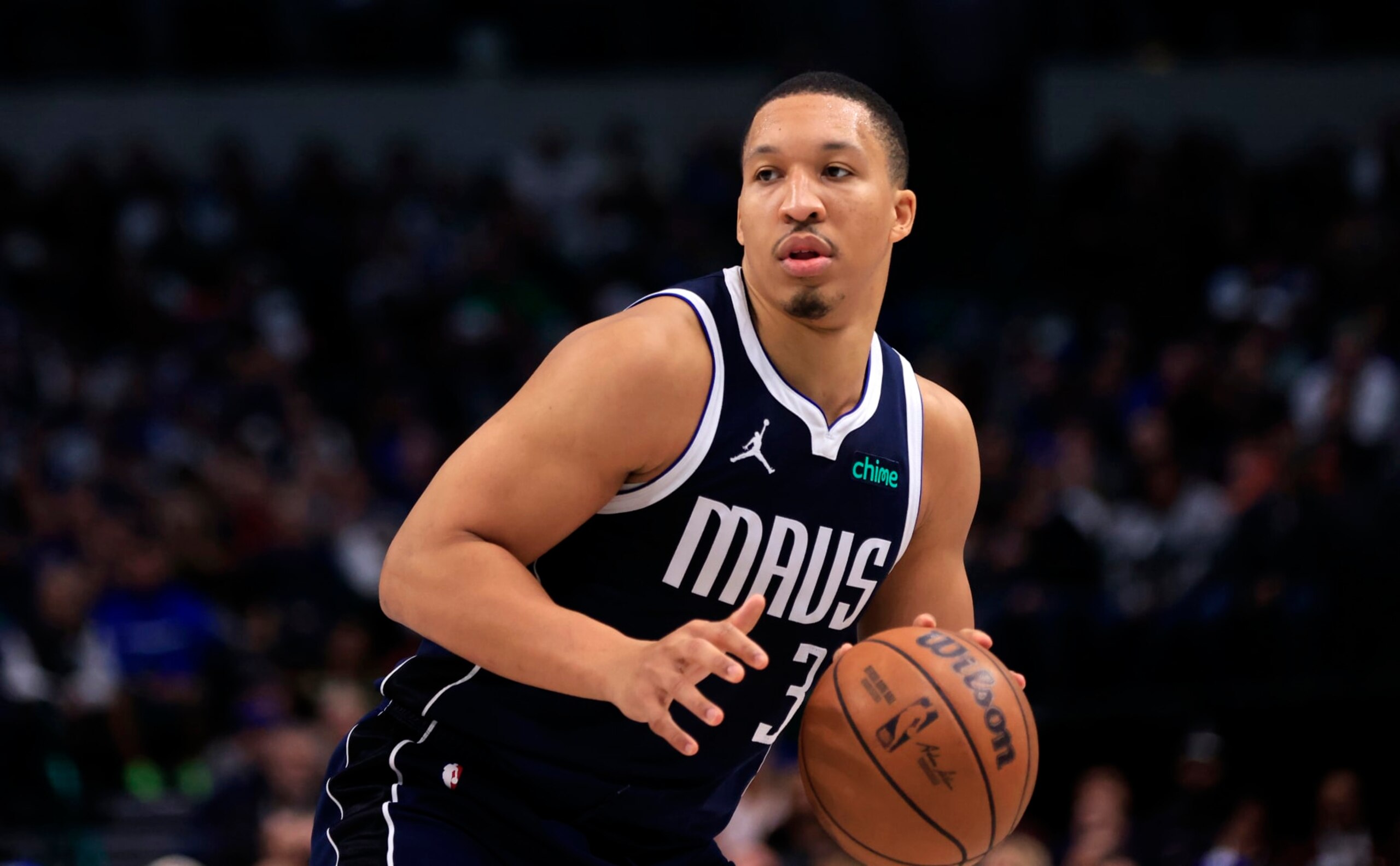 DALLAS, TX - JANUARY 27:  Grant Williams #3 of the Dallas Mavericks handles the ball against the Sacramento Kings in the second half at American Airlines Center on January 27, 2024 in Dallas, Texas. NOTE TO USER: User expressly acknowledges and agrees that, by downloading and or using this photograph, User is consenting to the terms and conditions of the Getty Images License Agreement. (Photo by Ron Jenkins/Getty Images)