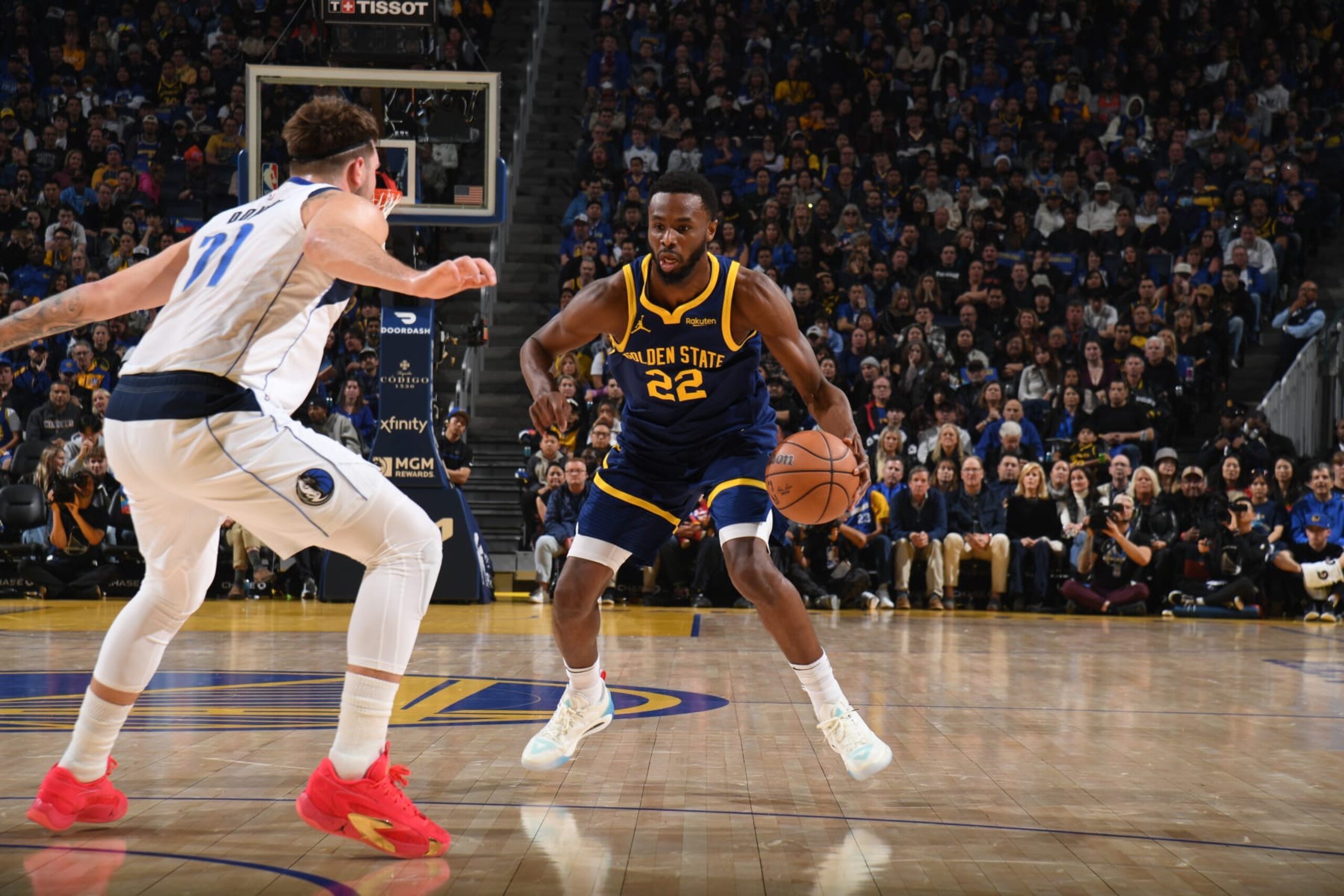 SAN FRANCISCO, CA - DECEMBER 30: Andrew Wiggins #22 of the Golden State Warriors dribbles the ball during the game against the Dallas Mavericks on December 30, 2023 at Chase Center in San Francisco, California. NOTE TO USER: User expressly acknowledges and agrees that, by downloading and or using this photograph, user is consenting to the terms and conditions of Getty Images License Agreement. Mandatory Copyright Notice: Copyright 2023 NBAE (Photo by Noah Graham/NBAE via Getty Images)