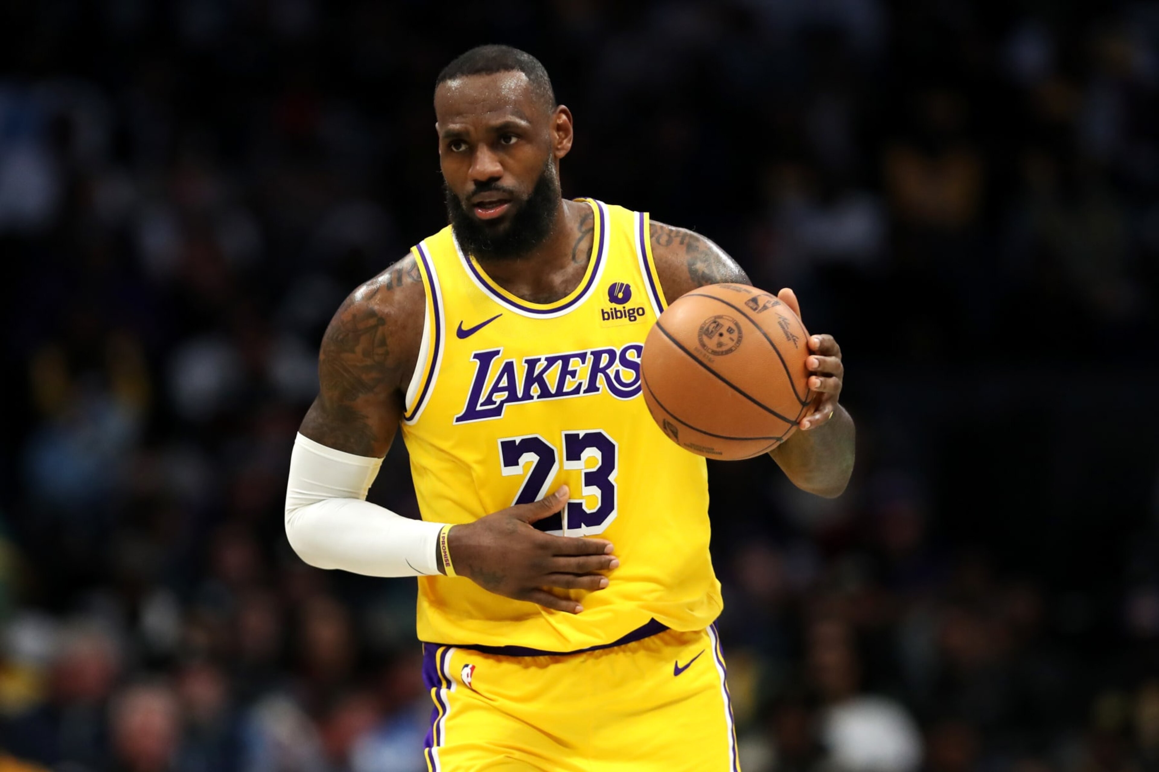 CHARLOTTE, NORTH CAROLINA - FEBRUARY 05: LeBron James #23 of the Los Angeles Lakers brings the ball down the court during the first half of a game against the Charlotte Hornets at Spectrum Center on February 05, 2024 in Charlotte, North Carolina. NOTE TO USER: User expressly acknowledges and agrees that, by downloading and or using this photograph, User is consenting to the terms and conditions of the Getty Images License Agreement. (Photo by David Jensen/Getty Images) CHARLOTTE, NORTH CAROLINA - FEBRUARY 05: LeBron James #23 of the Los Angeles Lakers brings the ball down the court during the first half of a game against the Charlotte Hornets at Spectrum Center on February 05, 2024 in Charlotte, North Carolina. NOTE TO USER: User expressly acknowledges and agrees that, by downloading and or using this photograph, User is consenting to the terms and conditions of the Getty Images License Agreement. (Photo by David Jensen/Getty Images)